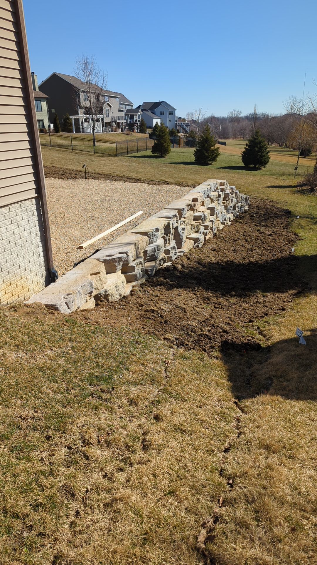 Retaining wall using Rosetta stone by ACE Waterproofing & Basement Solutions