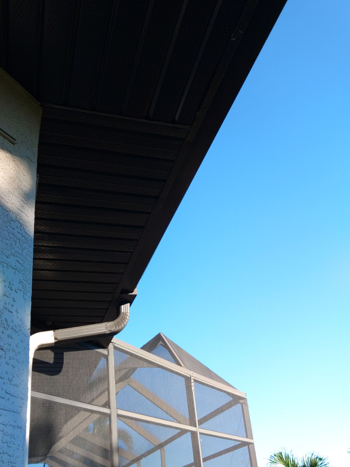 Dark Bronze Soffit Installation in Sarasota FL by Gutter Professors