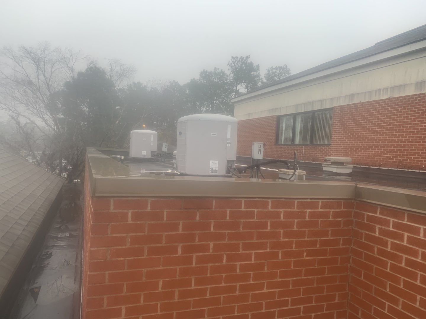 Re Roof (TPO) by American Roofing NC