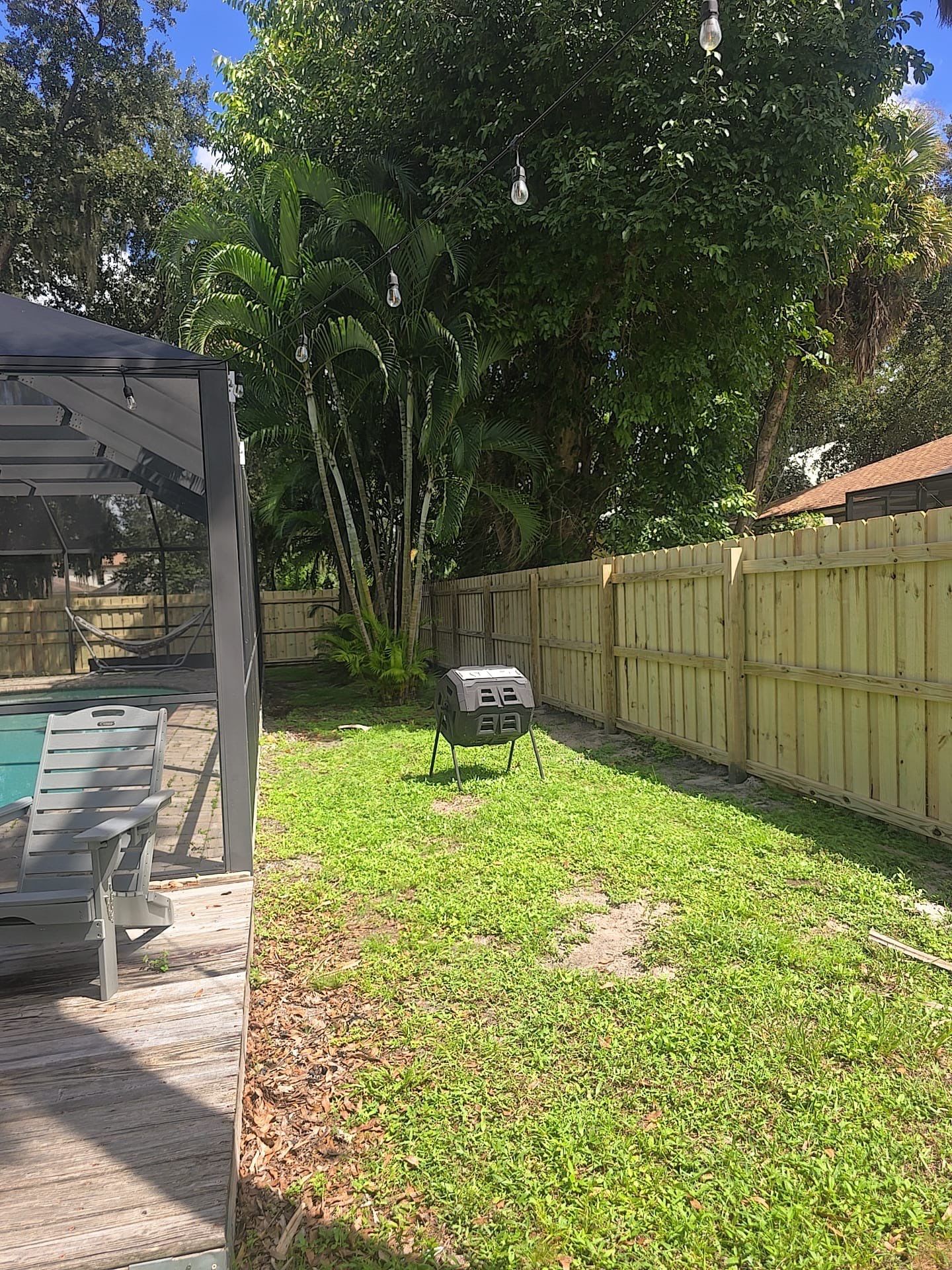 Wood Privacy Fence Installation with Double Gate in Port Charlotte by True Fence LLC