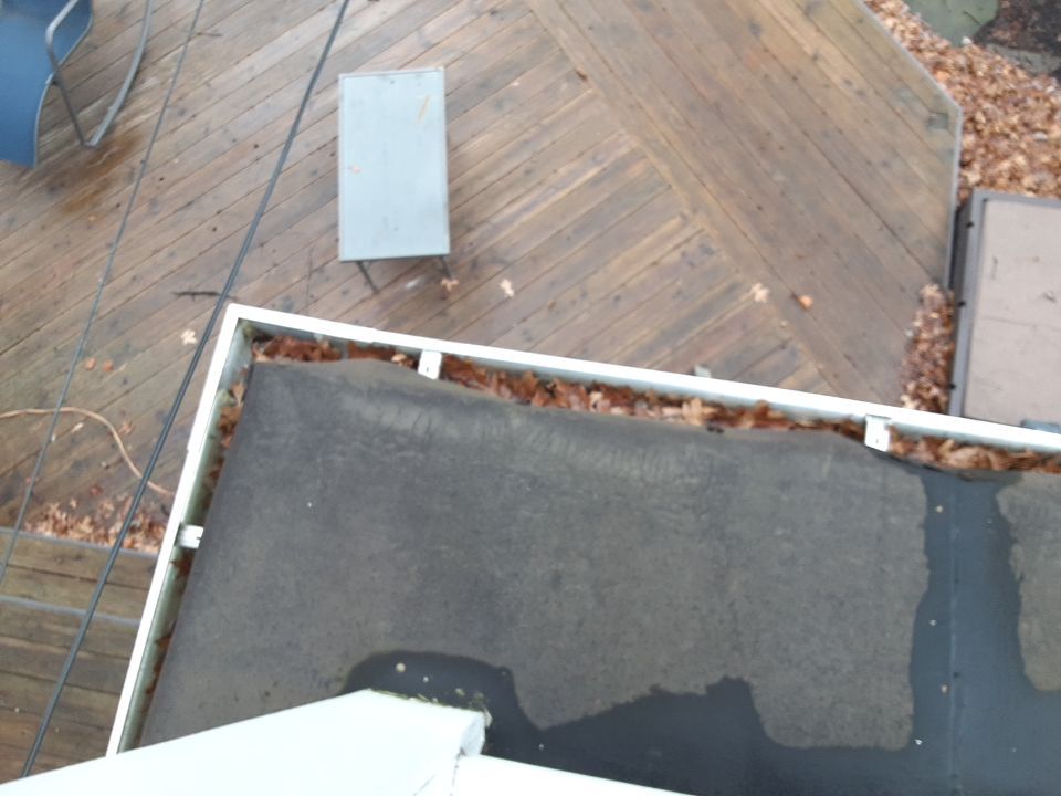 Residential Roof Replacement using Patio Roof by Absolute Roofing and Construction