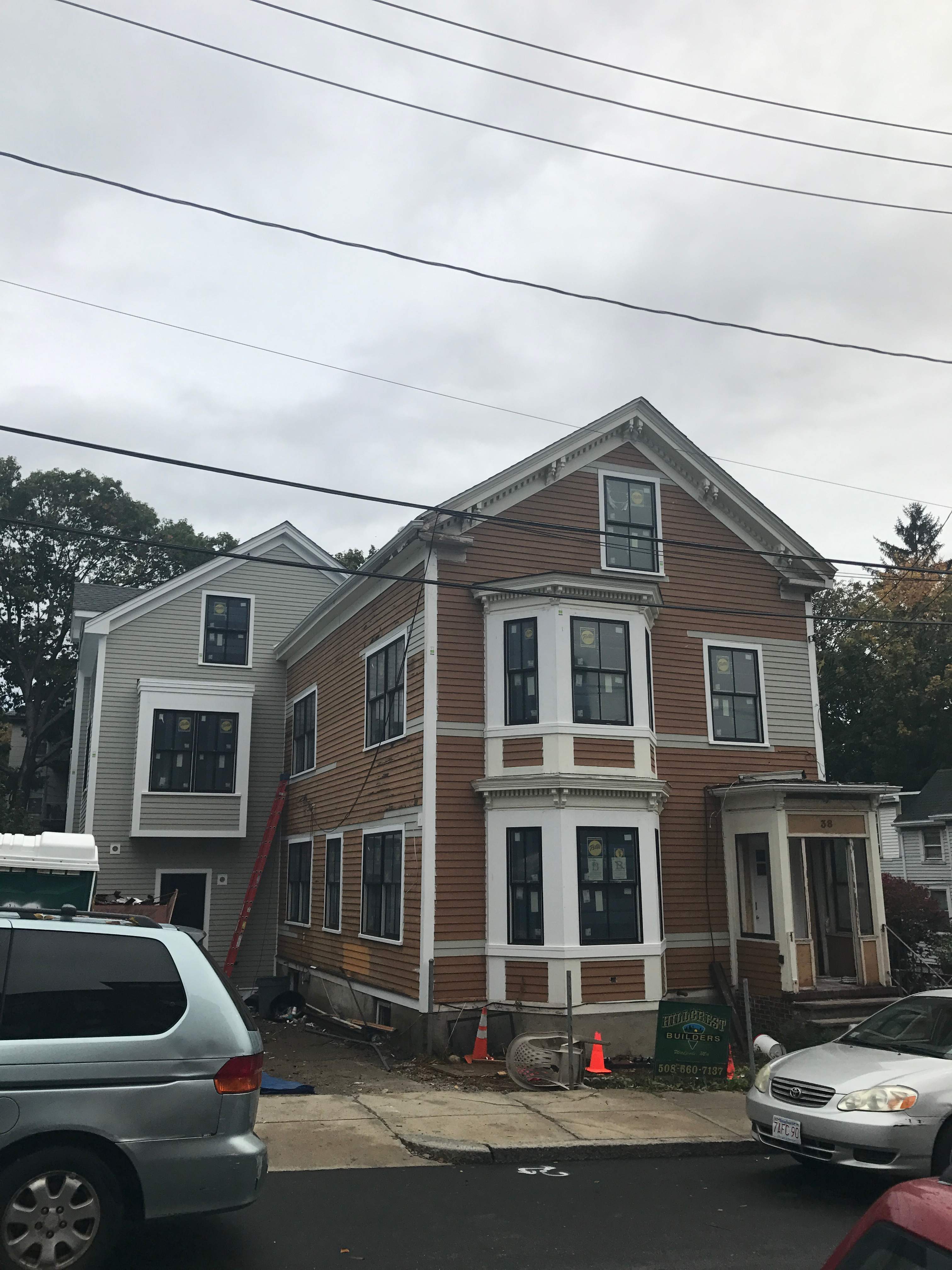Siding Installation using Wood Clapboards by UBrothers Construction