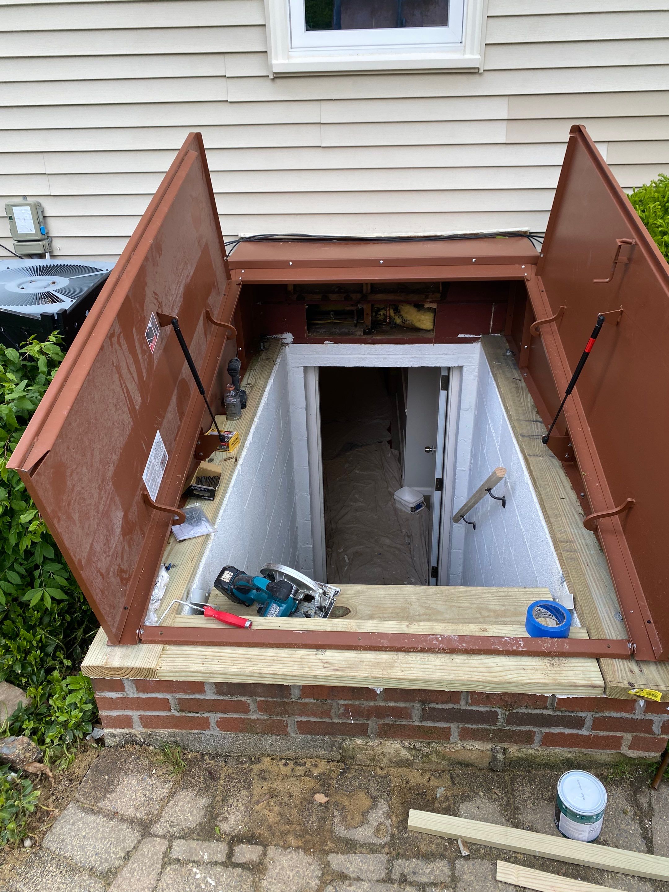 New Bilco doors to basement & new front porch posts by The Smet Companies, LLC