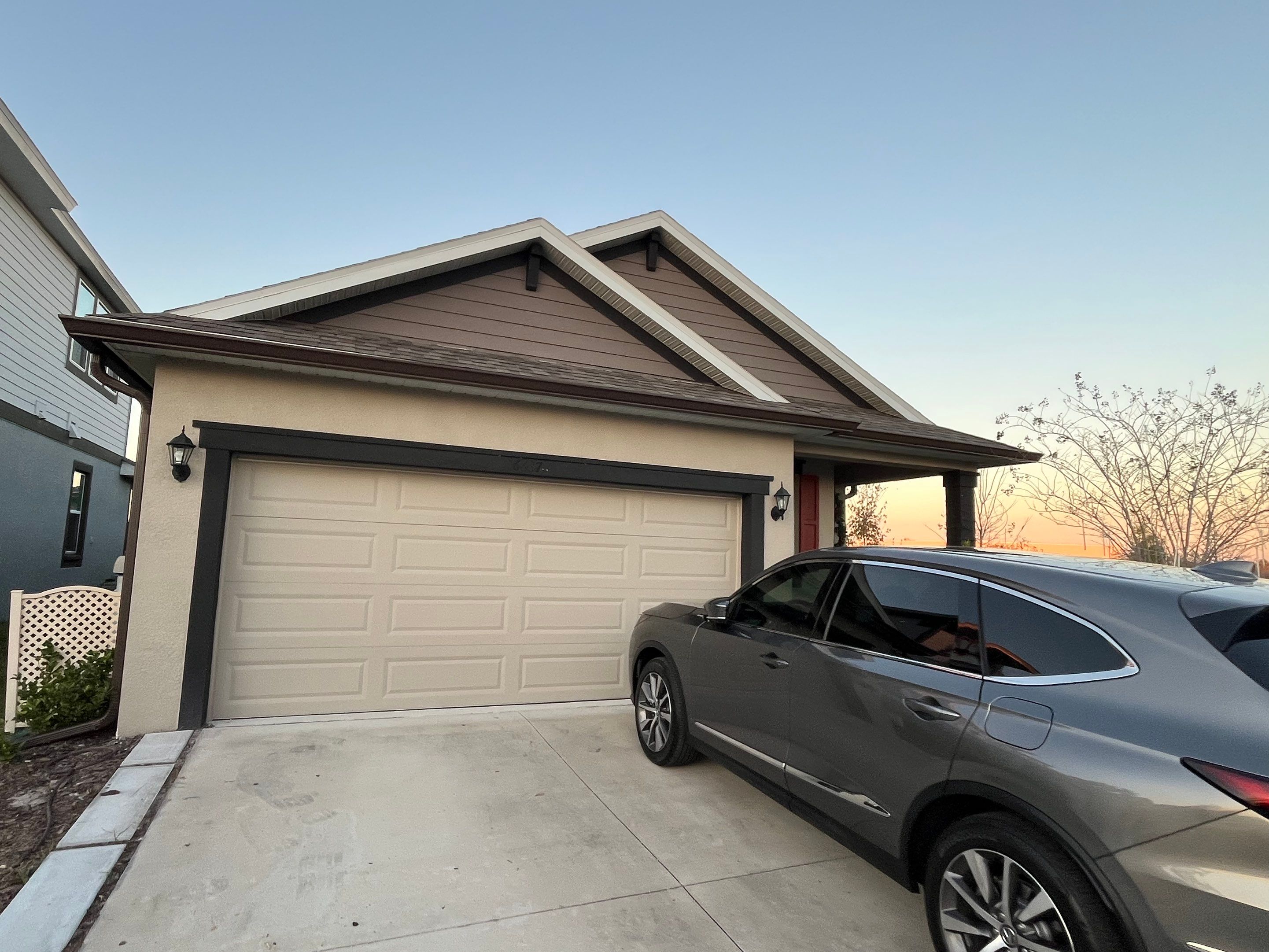 3X4 elbow Downspouts using Musket Brown Seamless Gutters in Lakeland FL by Gutter Professors