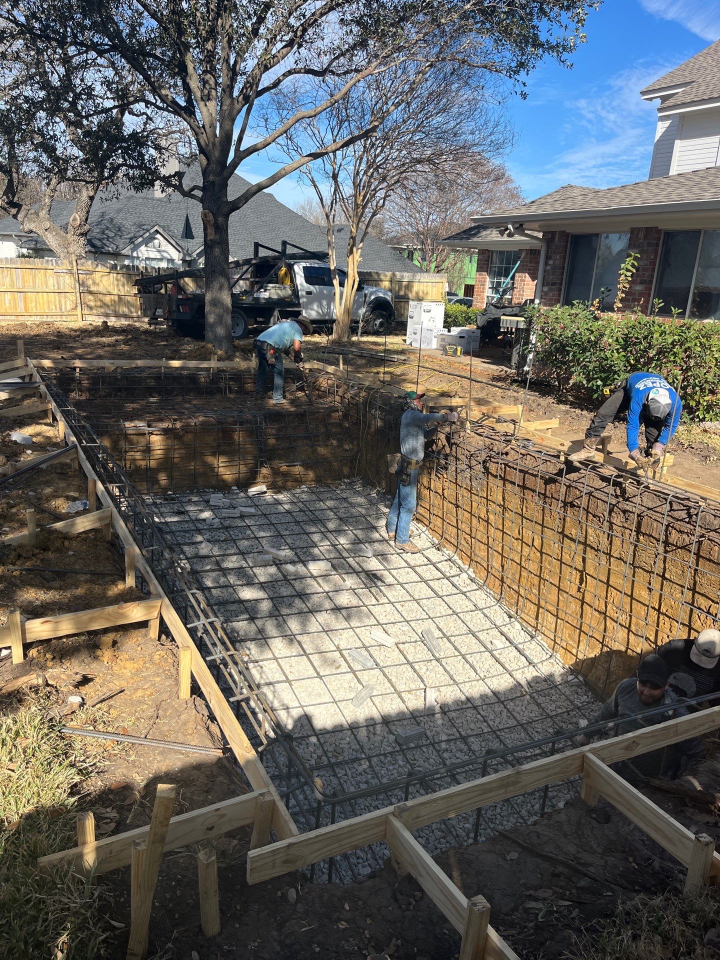 Modern Geometric Pool with Tanning Ledge by Pinnacle Pools and Spas - DFW