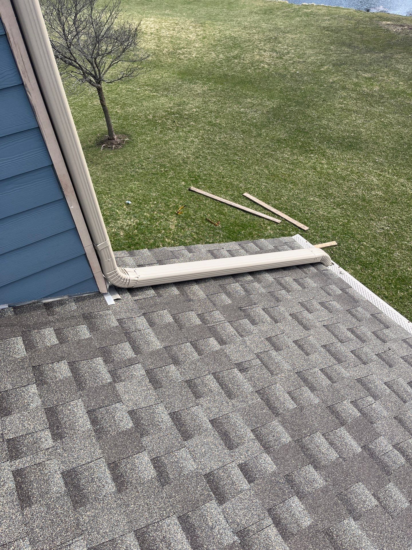 Asphalt Roof Replacement by Custom Installations