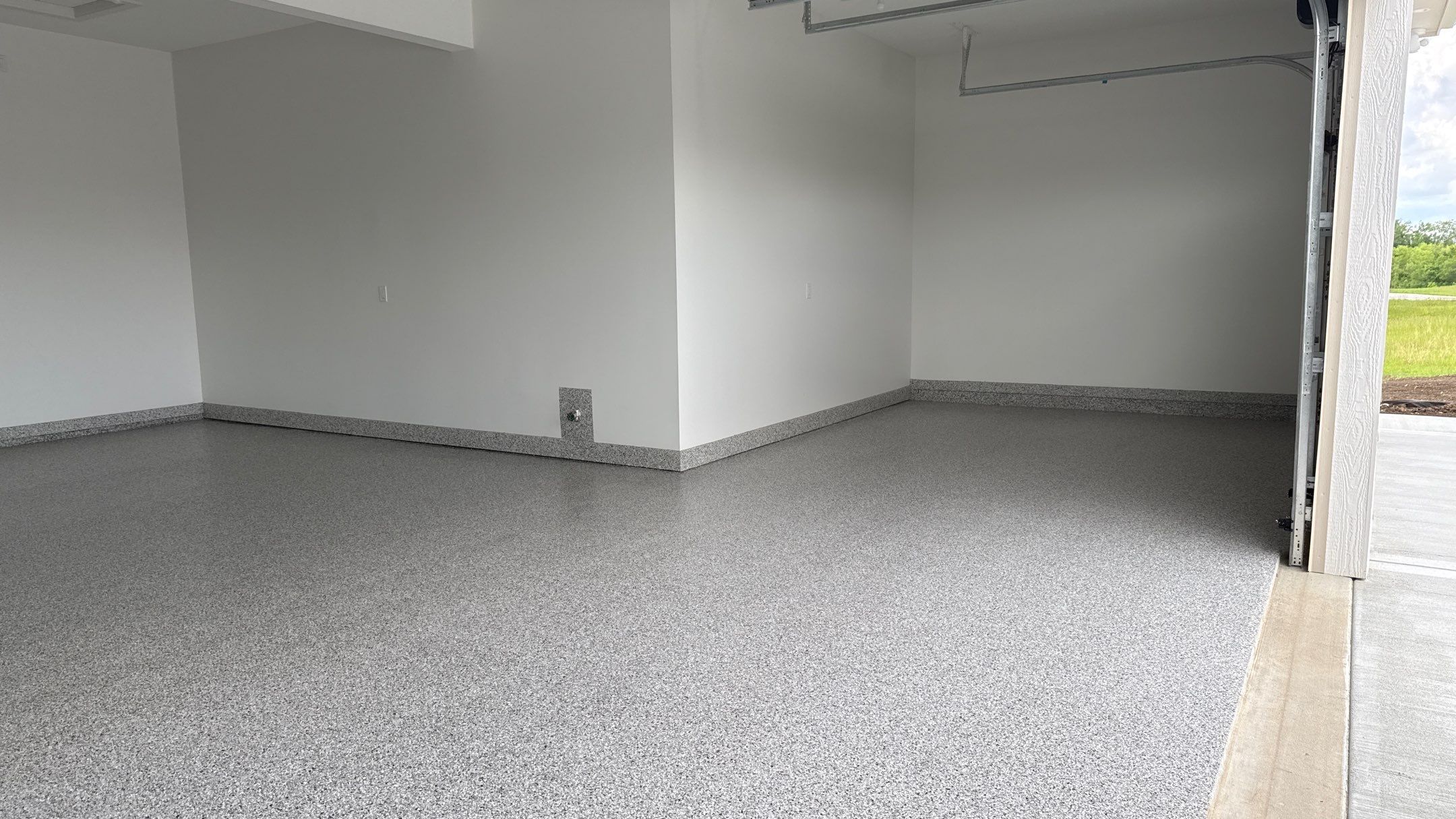 Christopher Has A Beautiful New Floor by Banner Garage