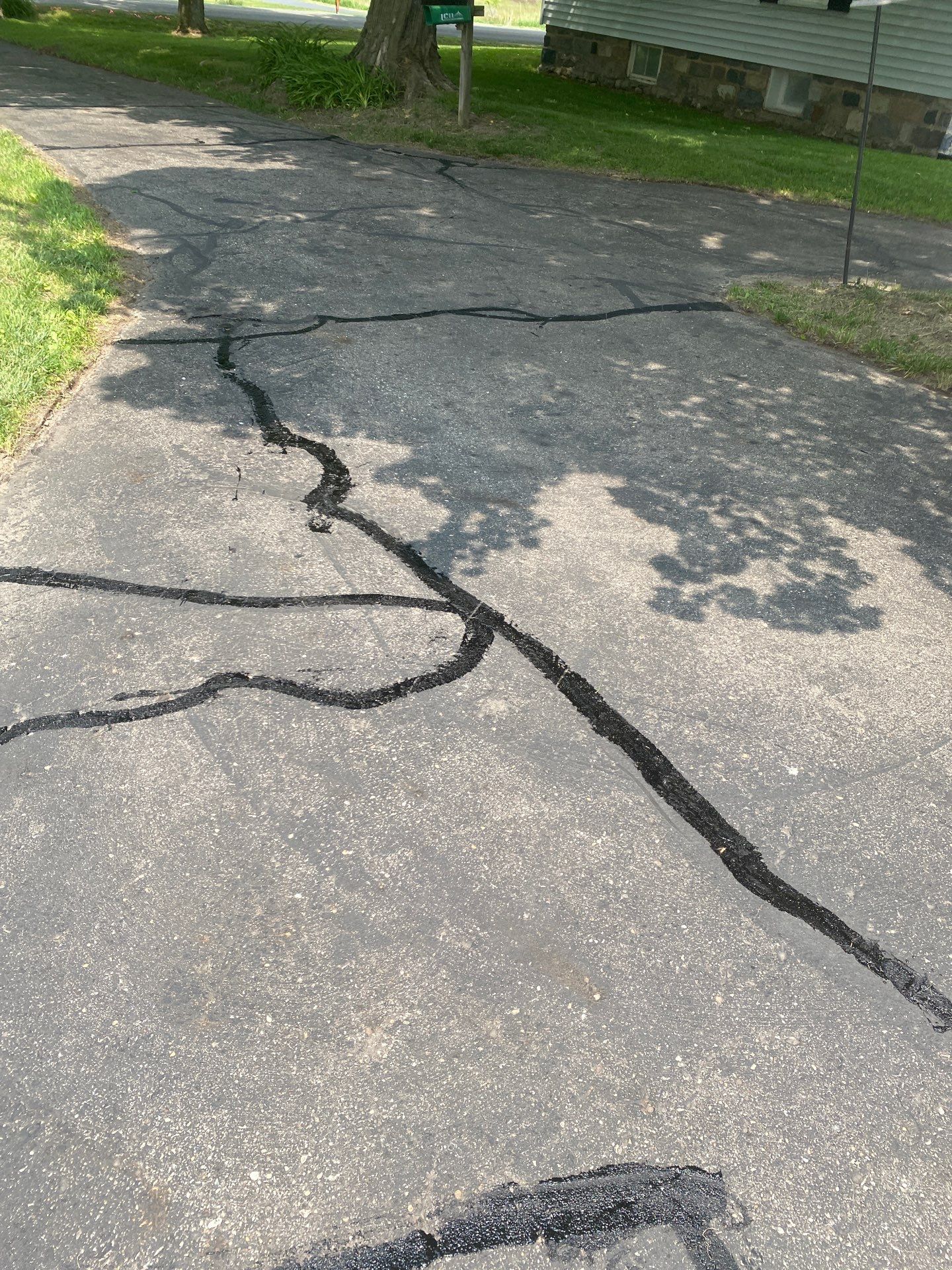 Residential Driveway Maintenance Charlotte MI by Quality Asphalt & Maintenance LLC