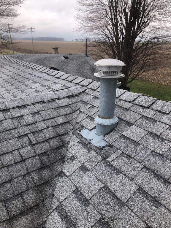 Storm damage roof replacement by Nitro Roofing and Construction