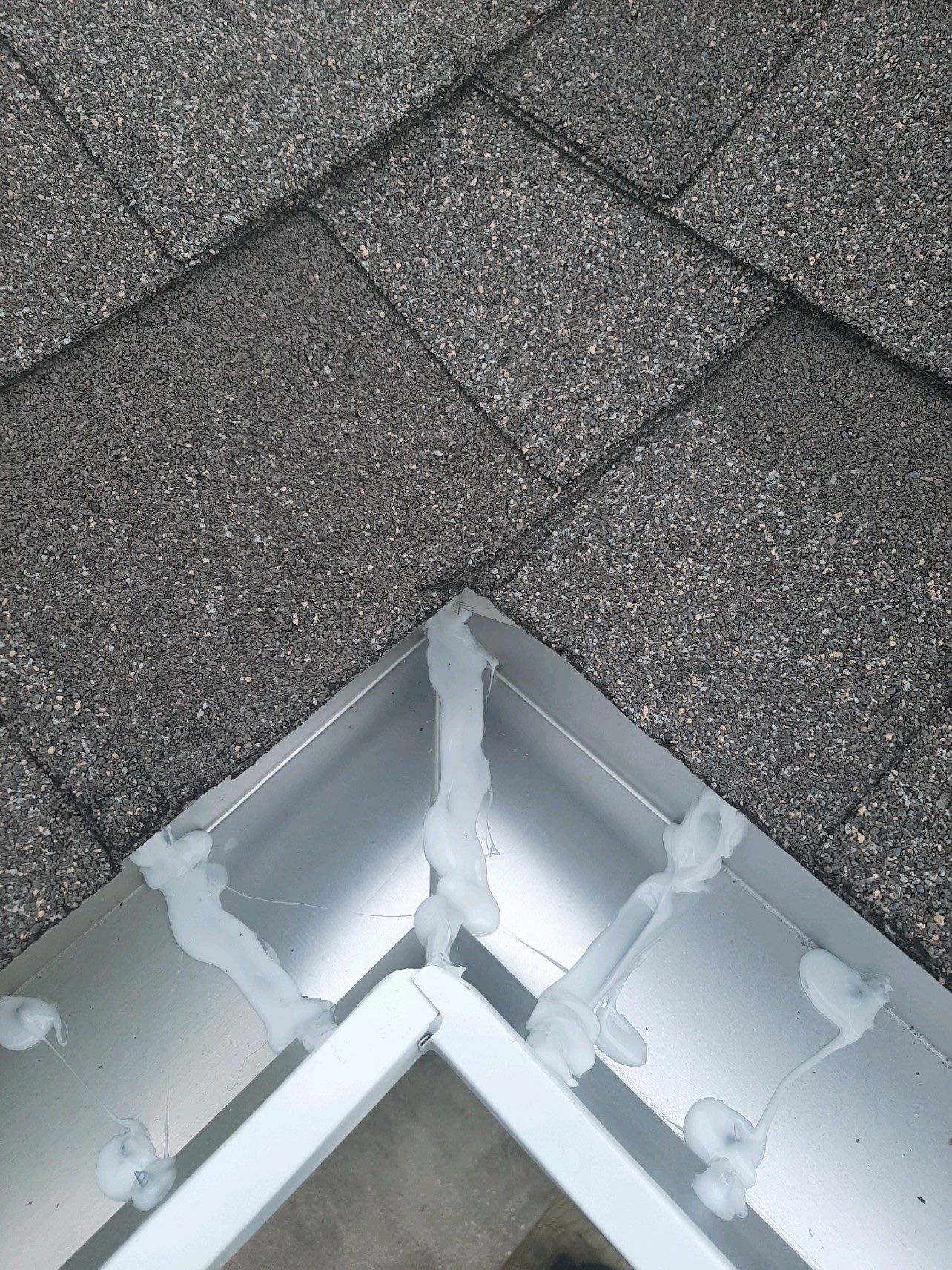 Gutter Installation Using White K-Style Seamless Gutters by Gutter Professors