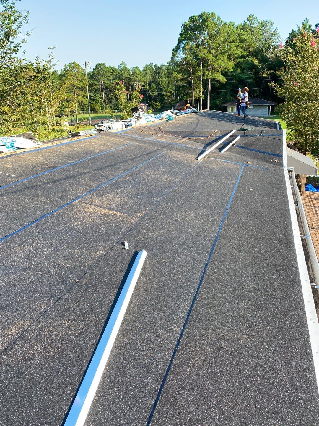 Commercial Roofing Installation using Roof Replacement by American Roofing & Construction LLC