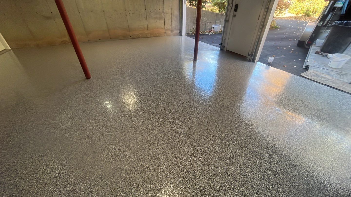 Garage in Londonderry, NH 03053 by Symphony Concrete Coatings