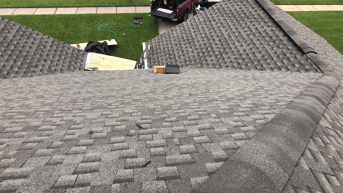 Residential Roofing Installation using Roof Replacement by American Roofing & Construction LLC