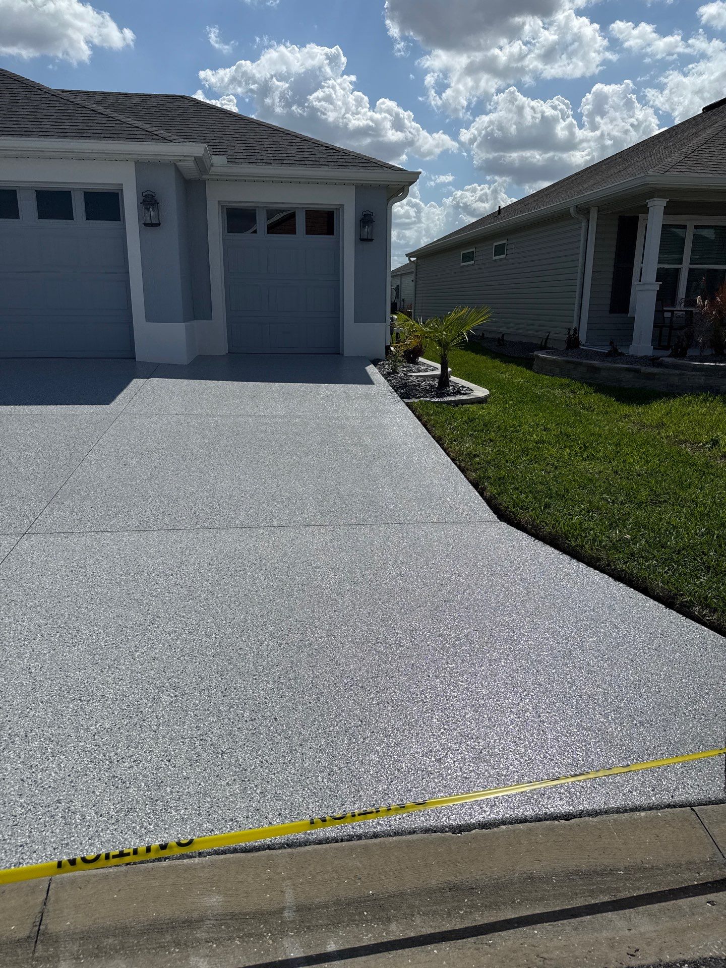Driveway in Tidal Wave by Innovative Concrete Coatings 