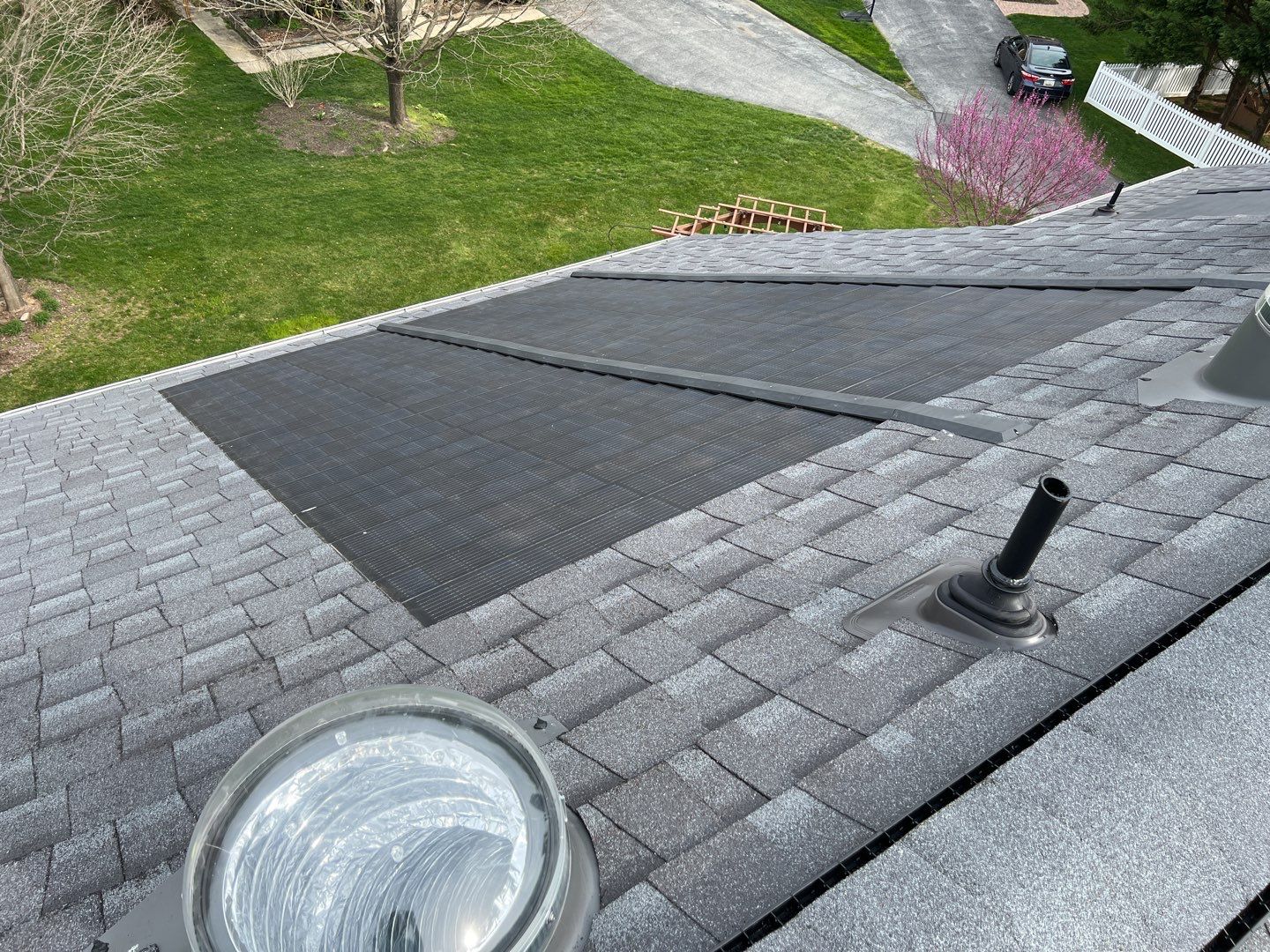 Solar Roof Replacement using GAF Timberline Solar Shingles by American Home Contractors