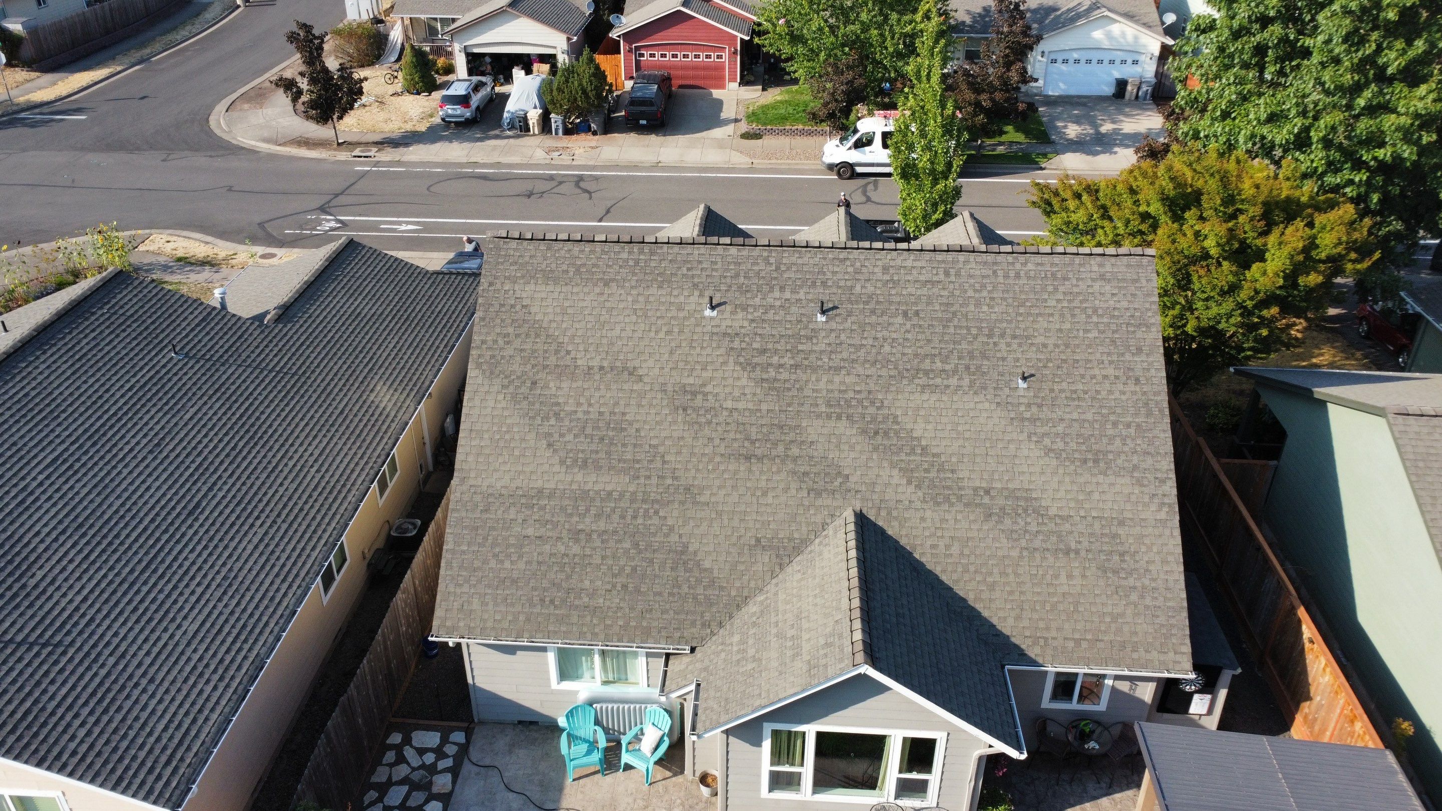 Granite Black Residential Roof Replacement by Orezona Building & Roofing Company, Inc.