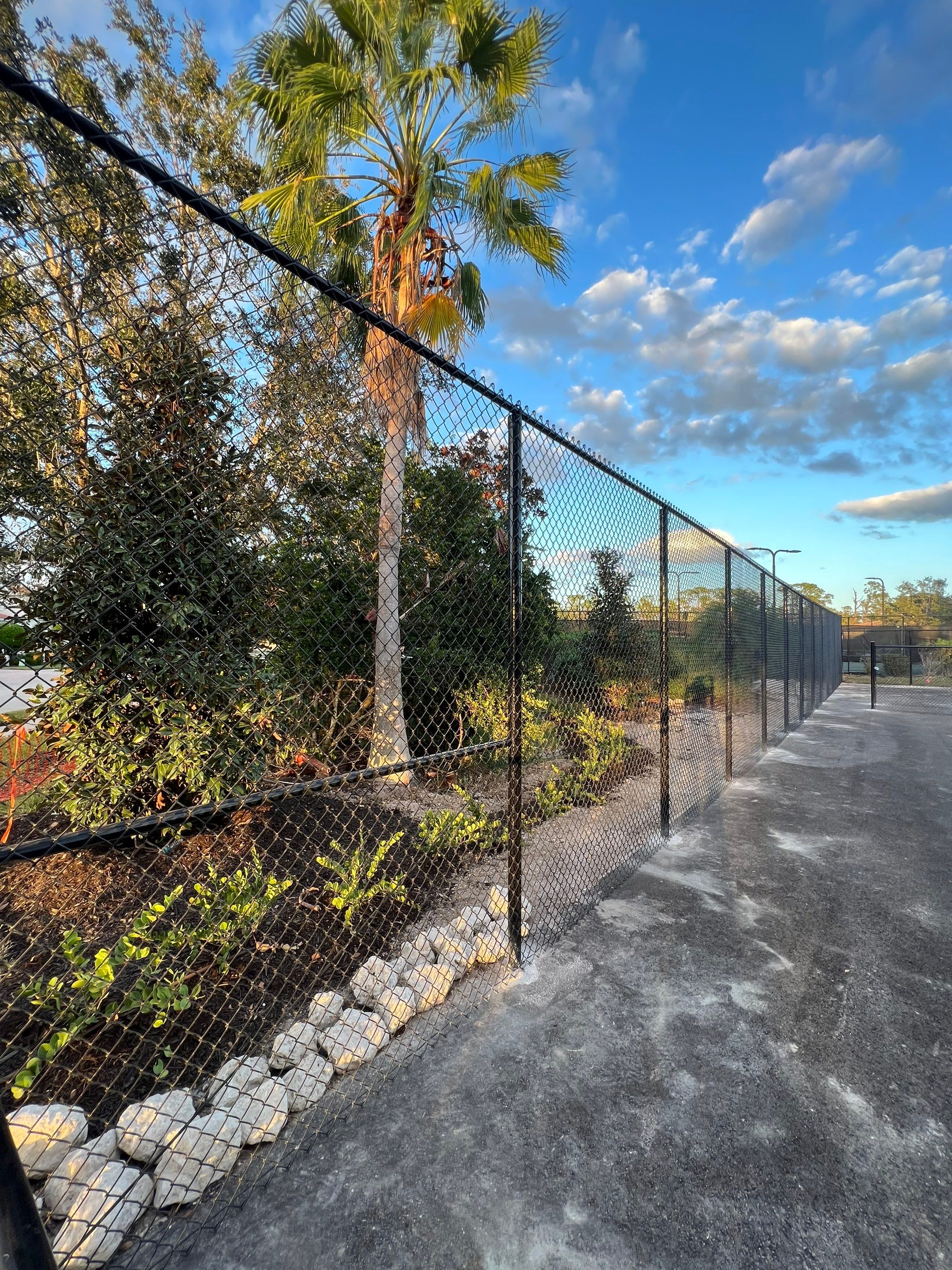 Chain-link Fence Installation using 8Ft Tall Black Chainlink Fence by Asap fence and gates, LLC