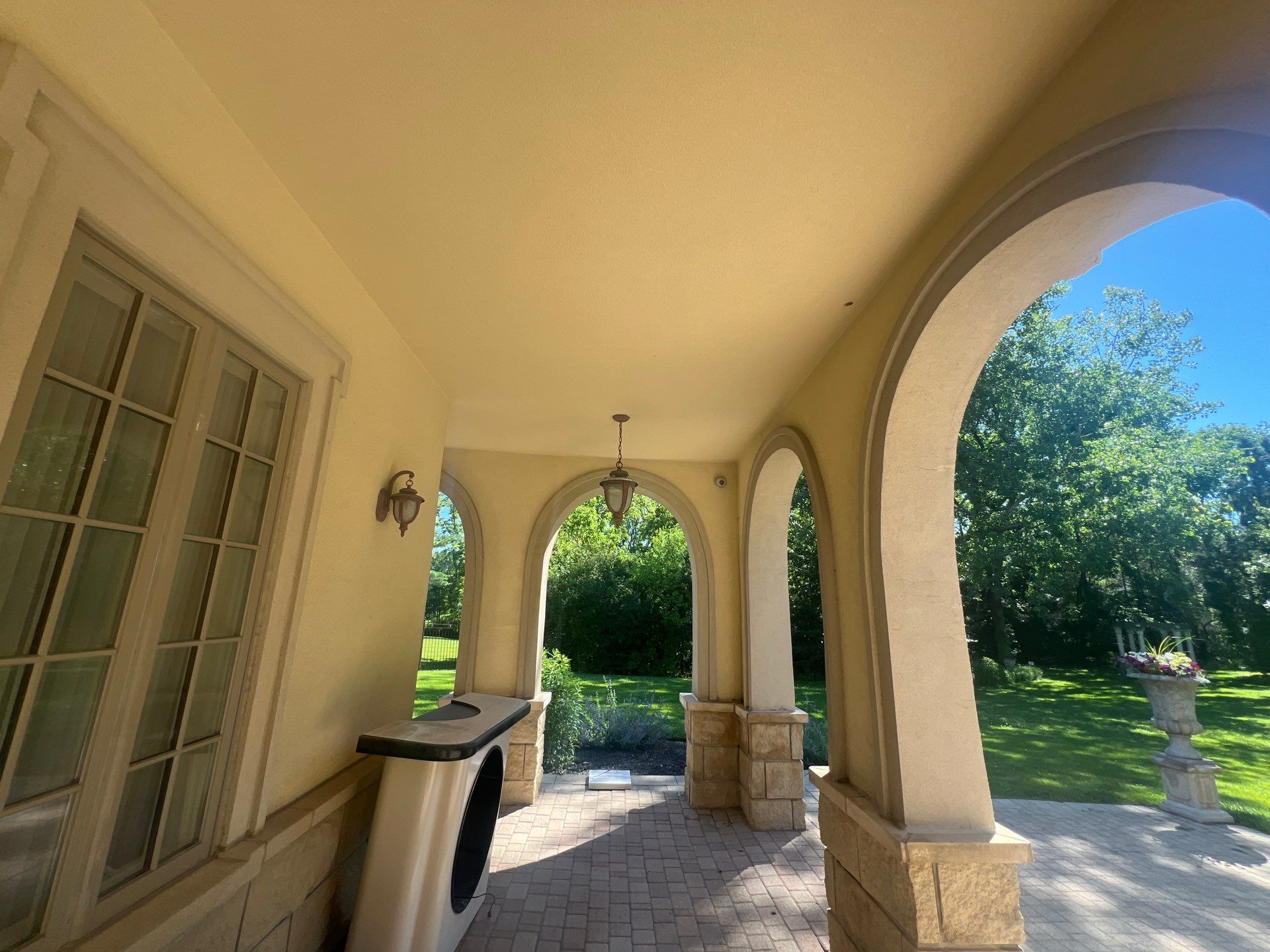 concrete cleaning using Algaecide, soft wash soap by Northern Power Washing LLC.