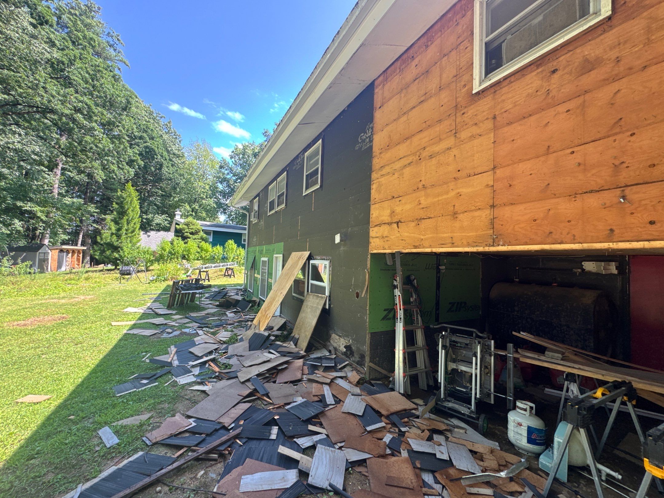 Full Vinyl Siding, Window & Door Replacement Near the Bellamy River in Dover, NH by Compass exteriors