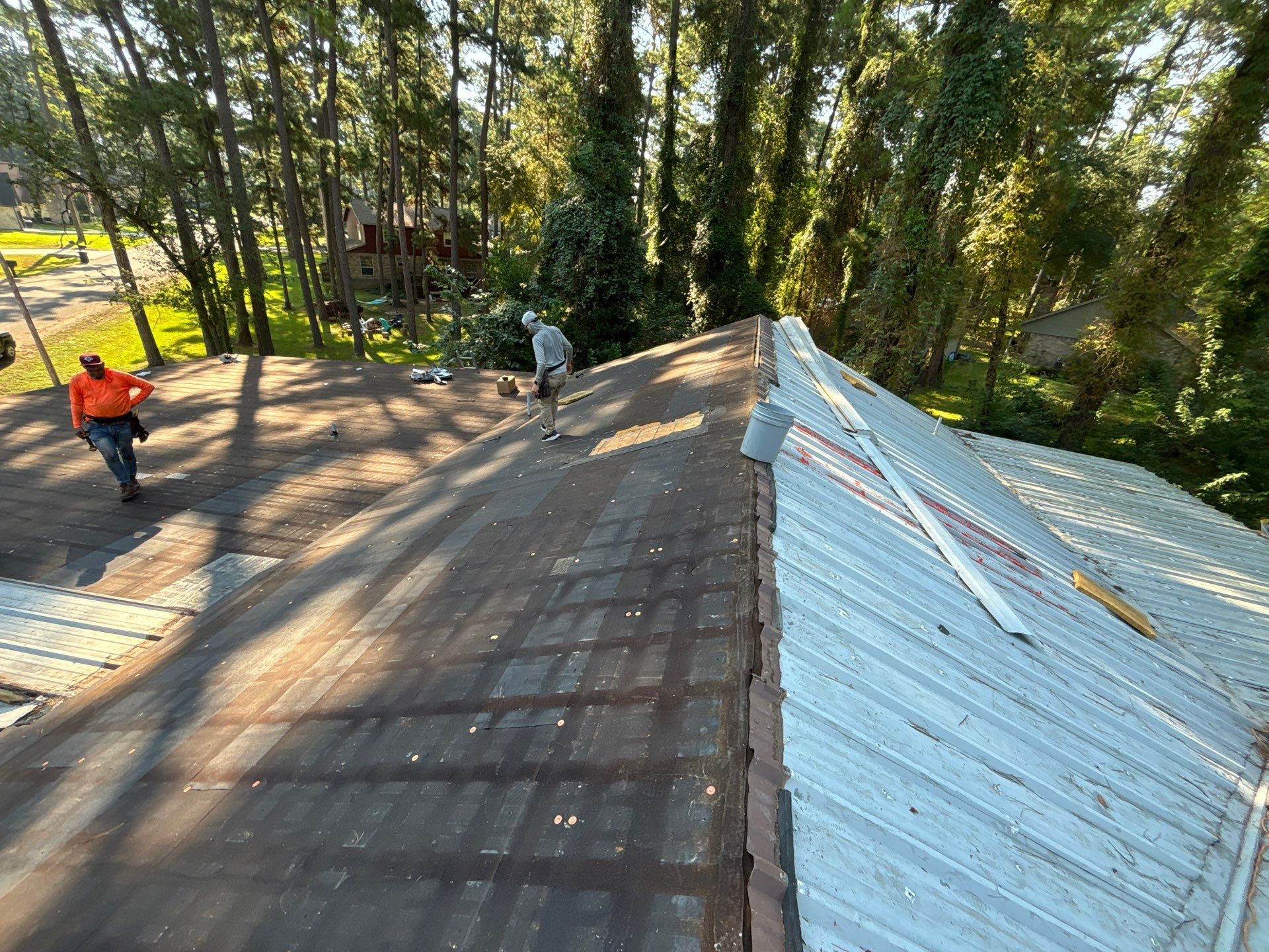 White Standing Seam Metal Roof Replacement in Willis, Texas by Abbott Roofing Company