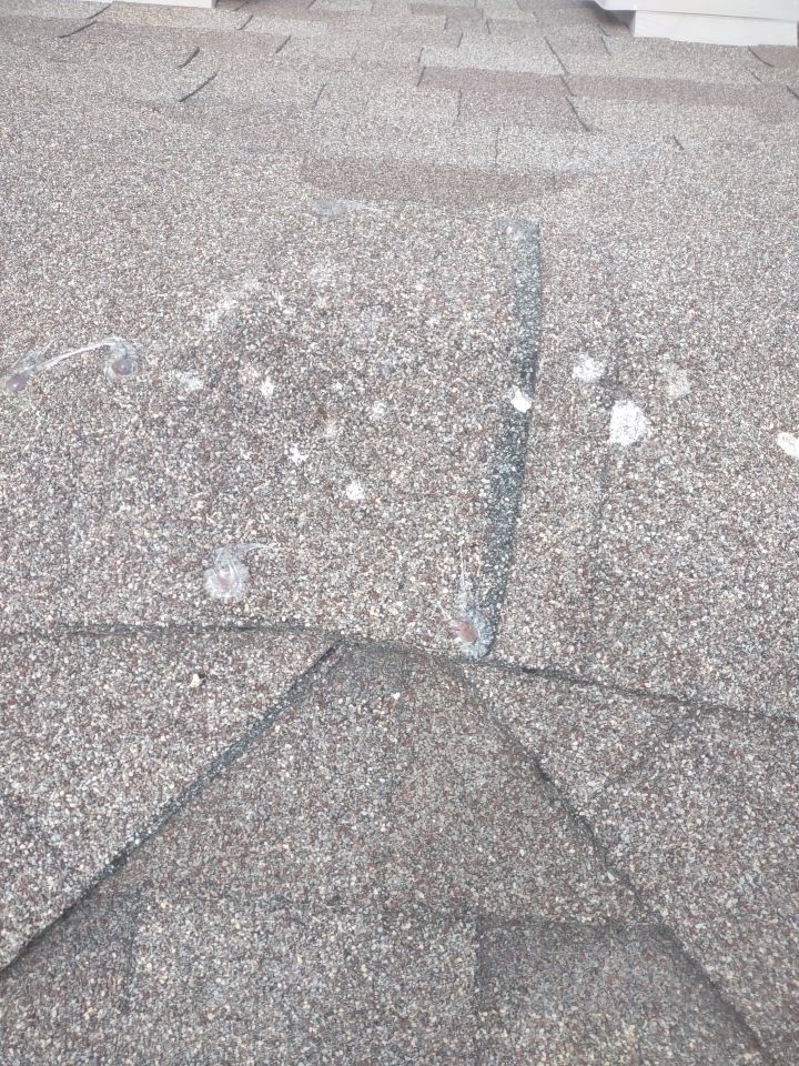 Roof Damage by Bros Roofing