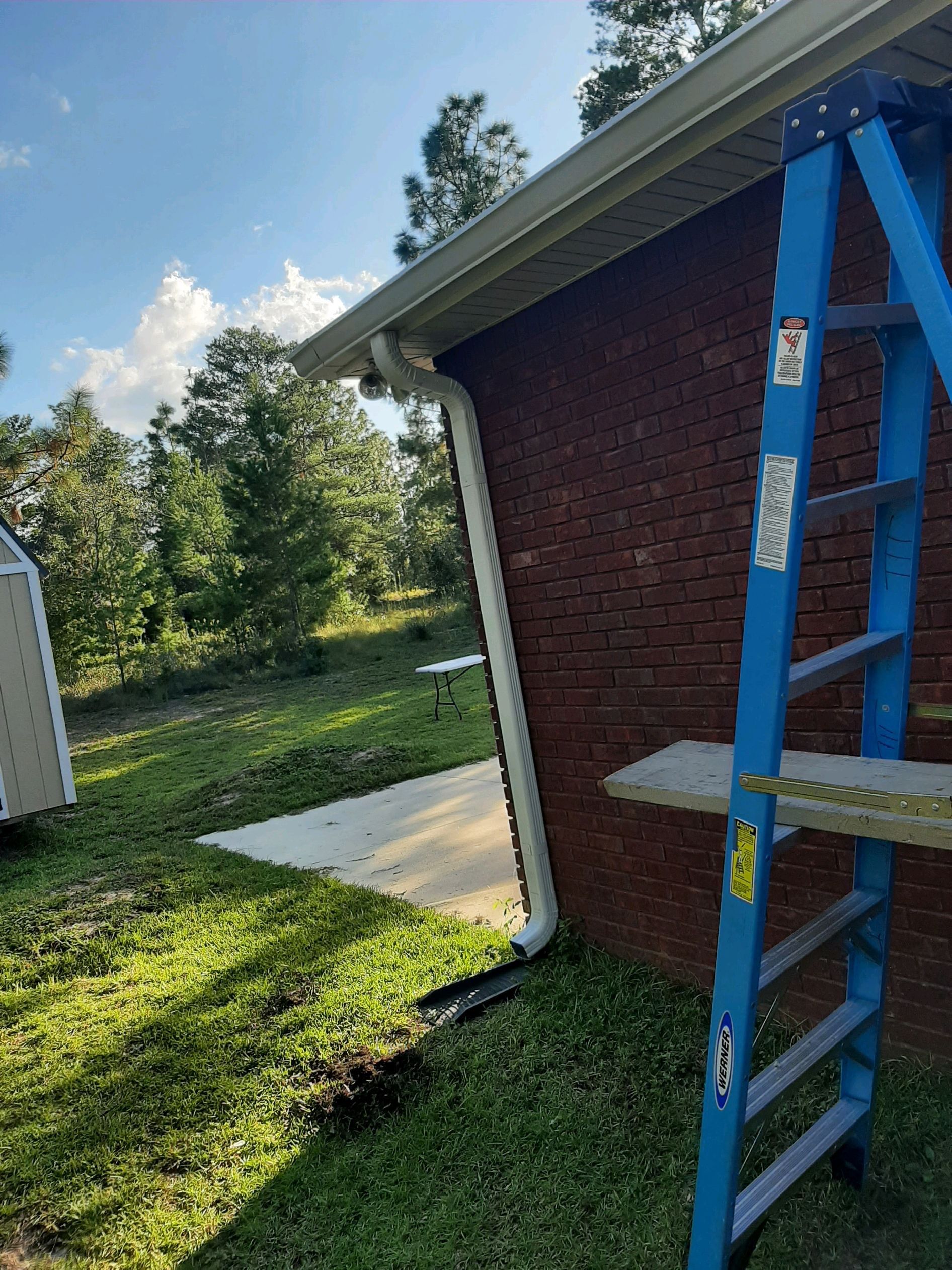 Gutter Installation using White K-Style Seamless Gutters by Gutter Professors