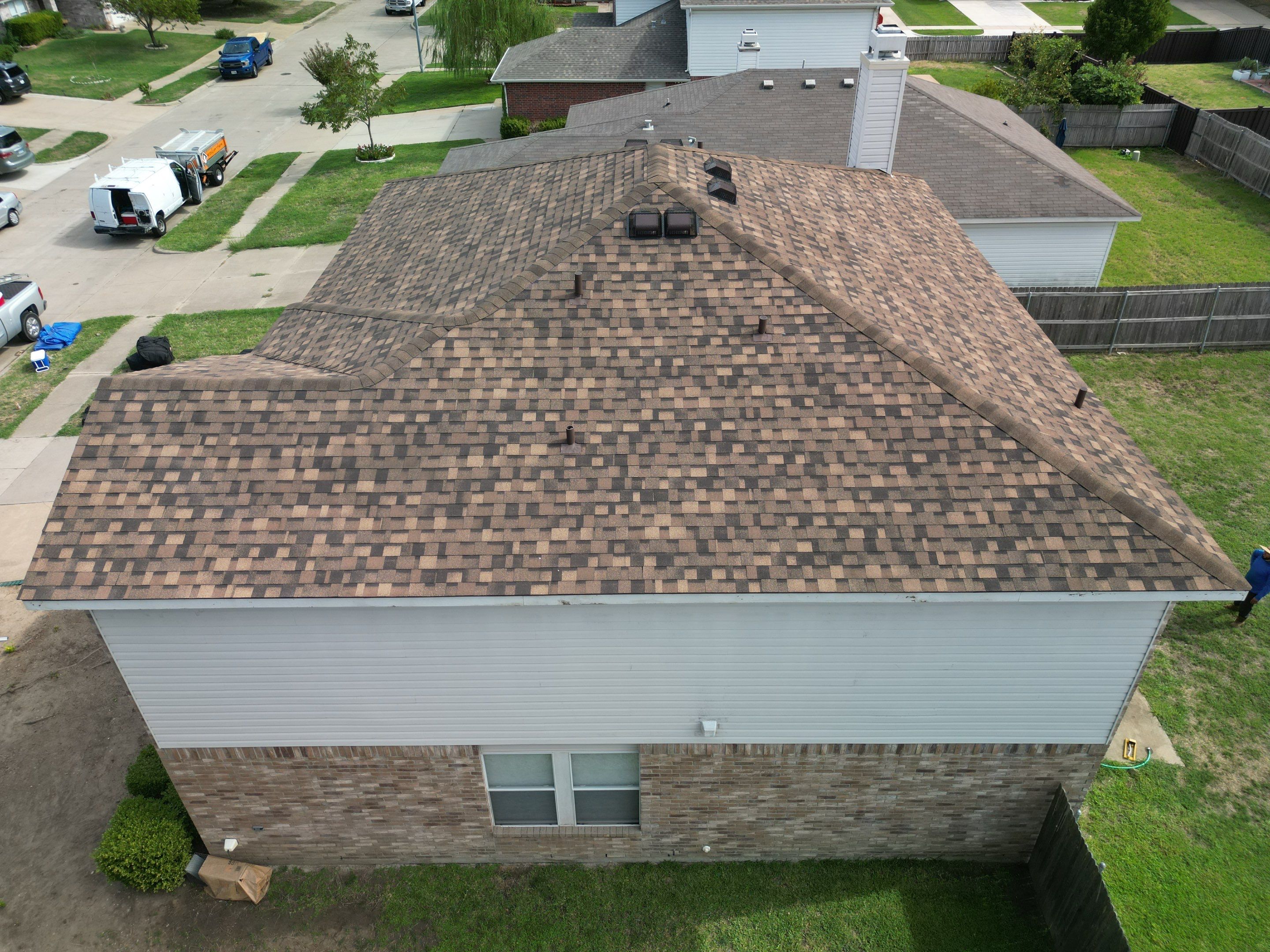 Full Roof Replacement, Chimney Rebuild and Interior Damage Replacement by First United Roofing & Construction