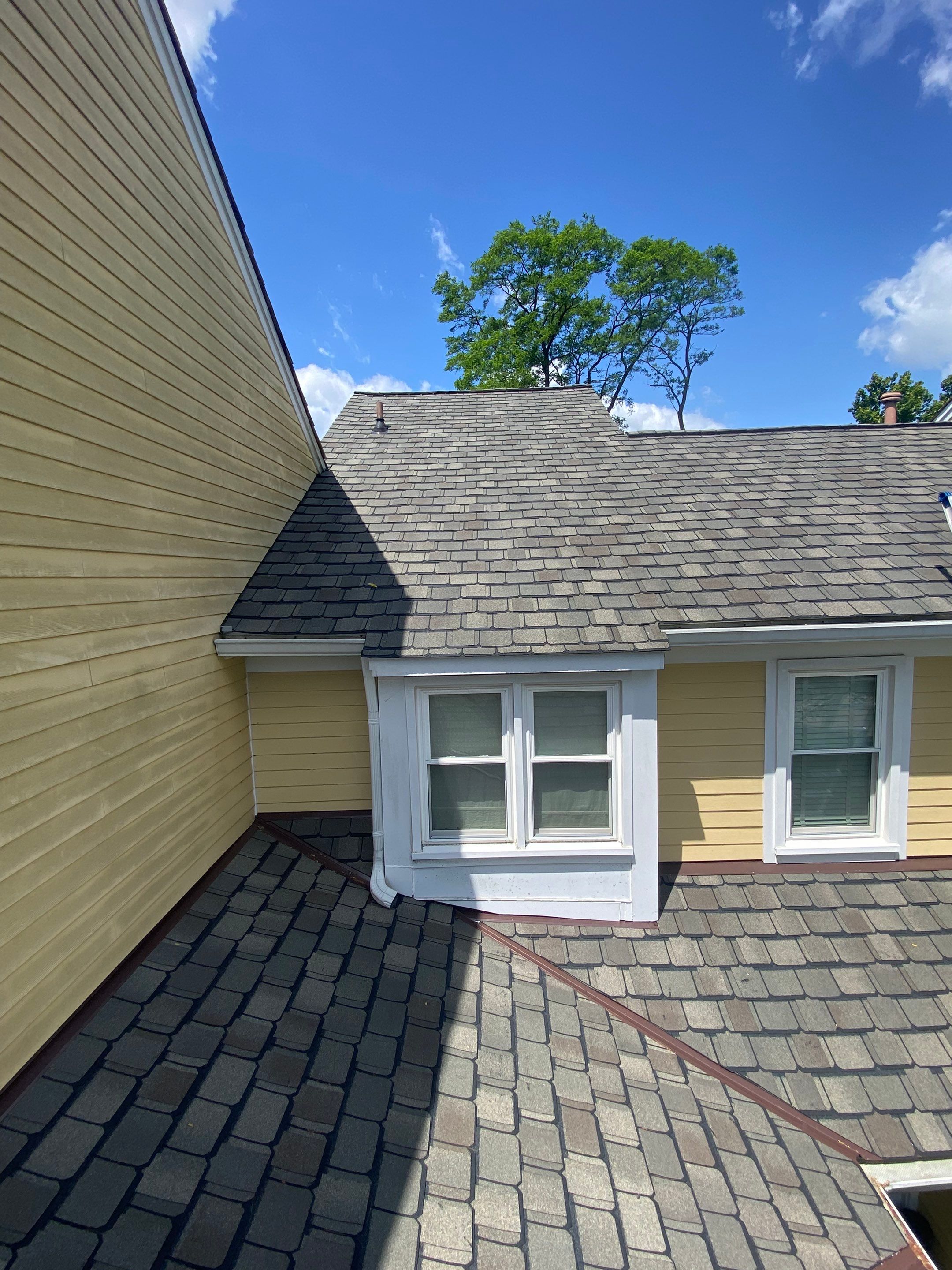 Arlington: CertainTeed Grand Manor Designer Shingles in Weathered Wood by RM Banning, Inc.