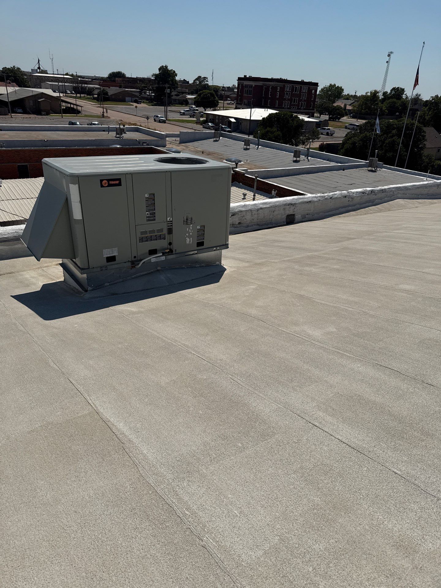 Hollis High School Comprehensive TPO Roof Replacement and Restoration by Secondary Rhodes