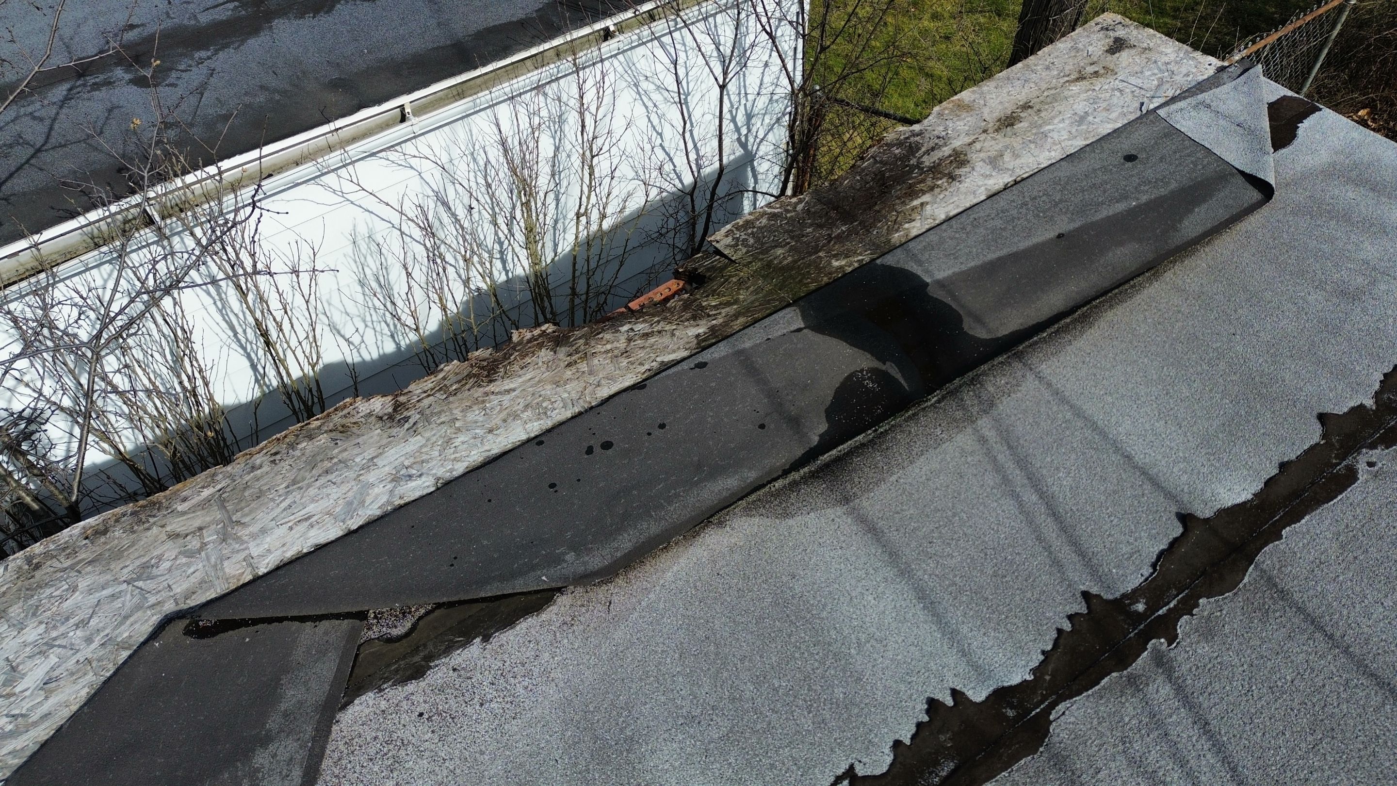 Detached Garage Roof and Decking Replacement by Atlas Roofing & Restoration
