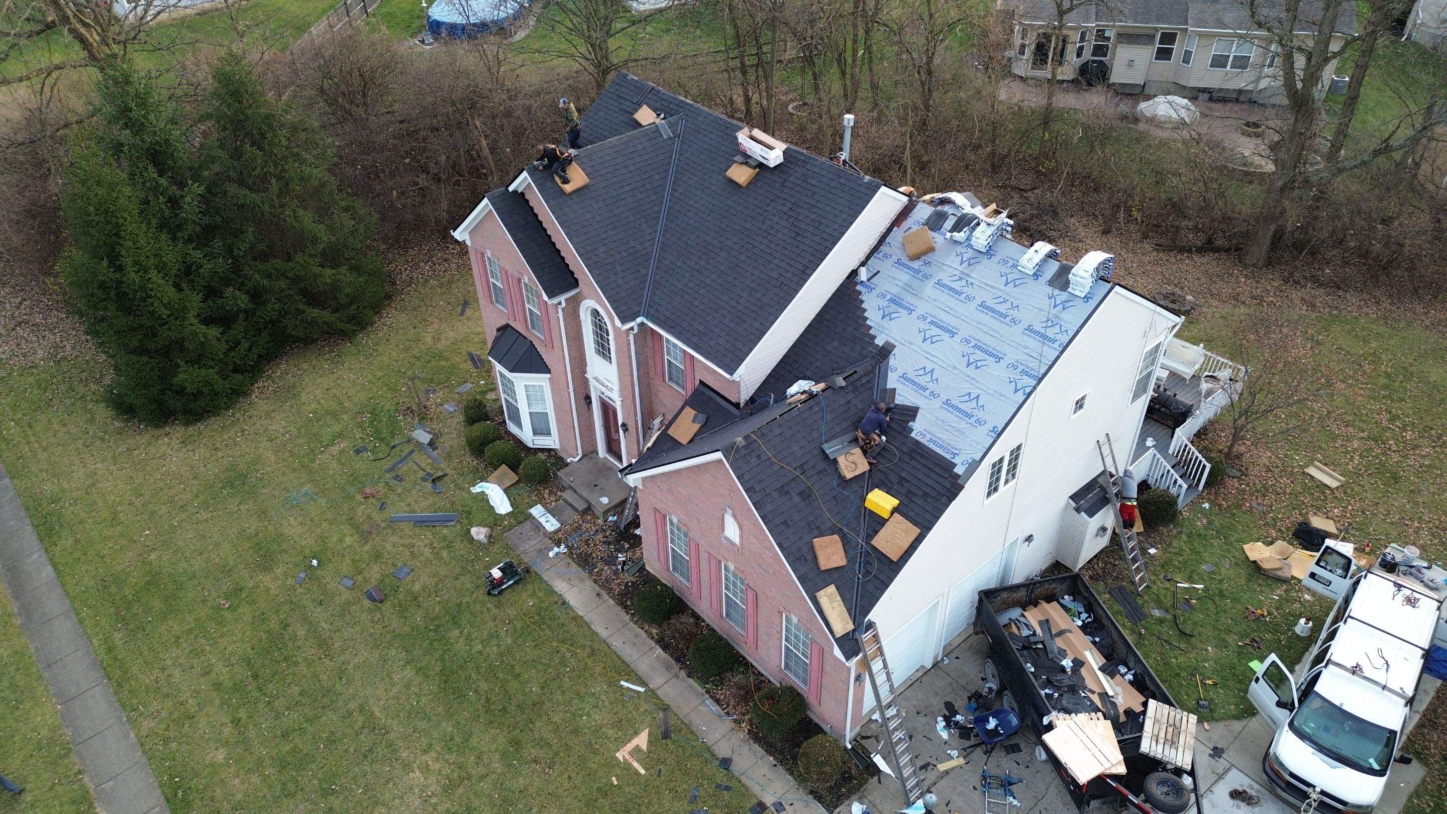 Walden Ponds - Pristine Black and Hydro Flo Gutter Guards by Tamlin Roofing