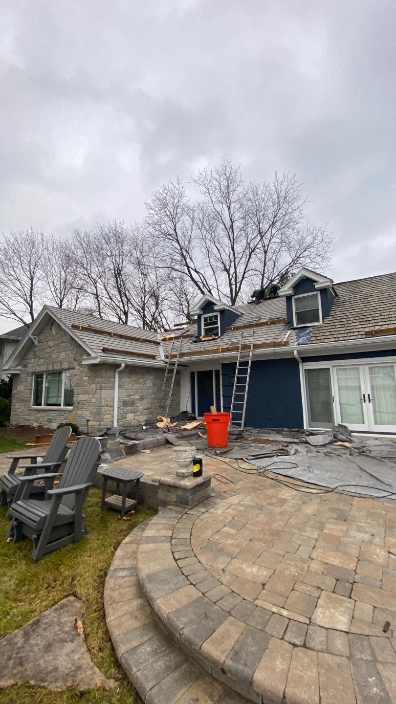 DaVinci Roof Installation with Snow Guards in Oconomowoc Lake by Custom Installations