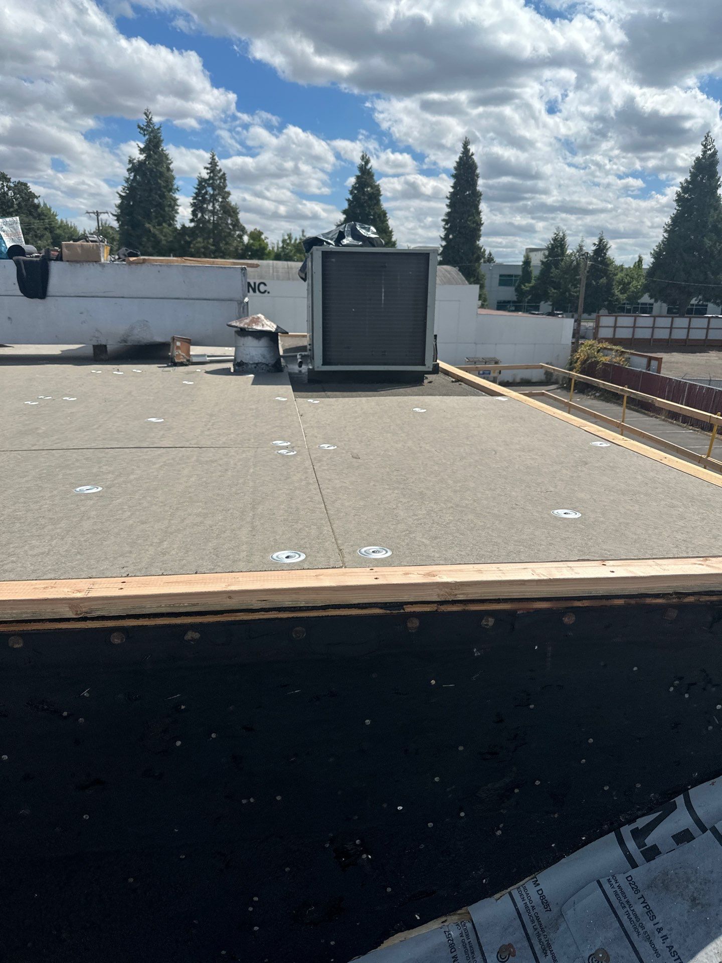 Summit Grey Lum Yun Salem Oregon Commercial Roof by Orezona Building & Roofing Company, Inc.