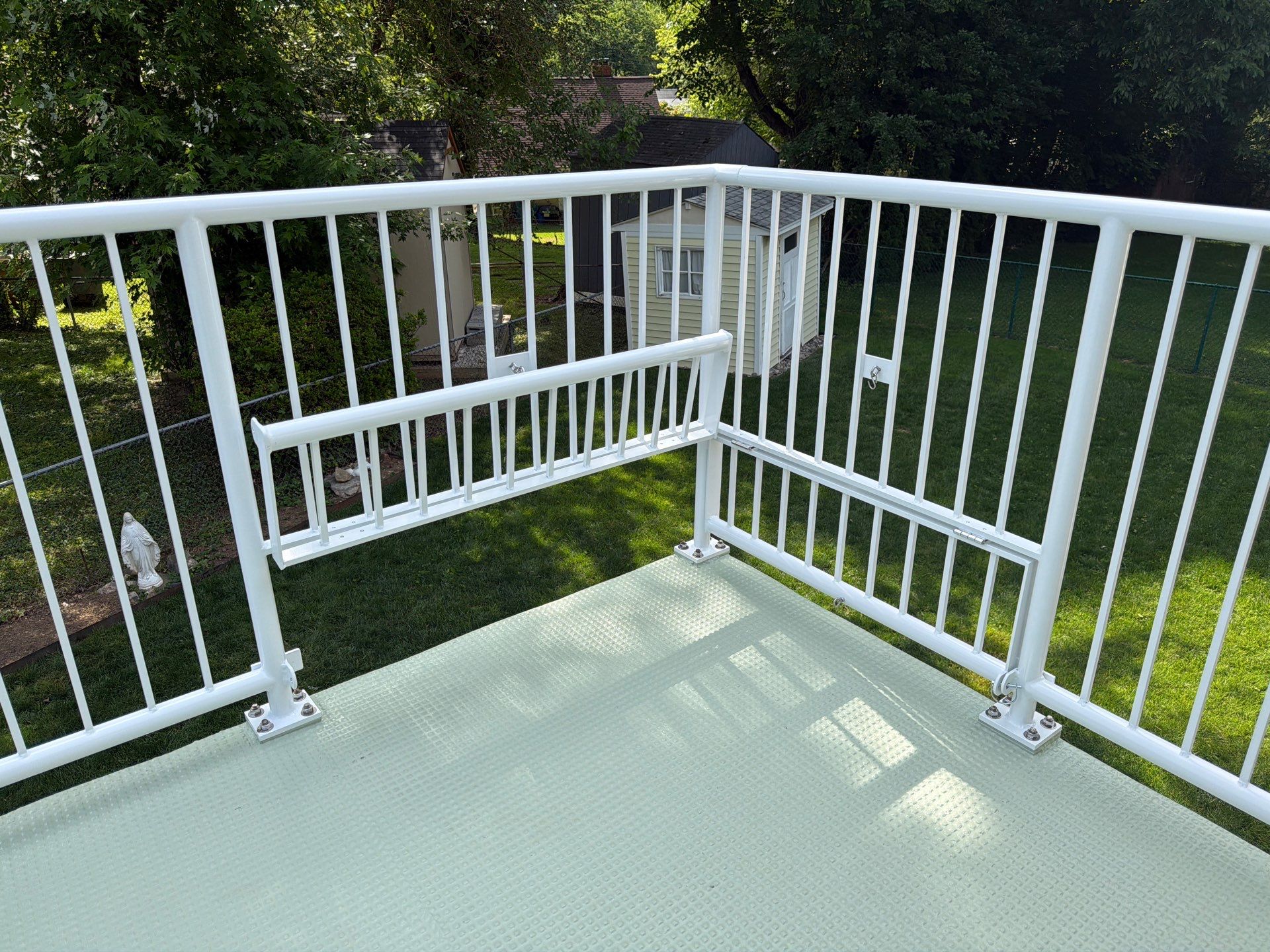 White Powder-Coated Outdoor Railings in Rockville & Staircase and Deck Refurbishment  by Capitol Iron Works