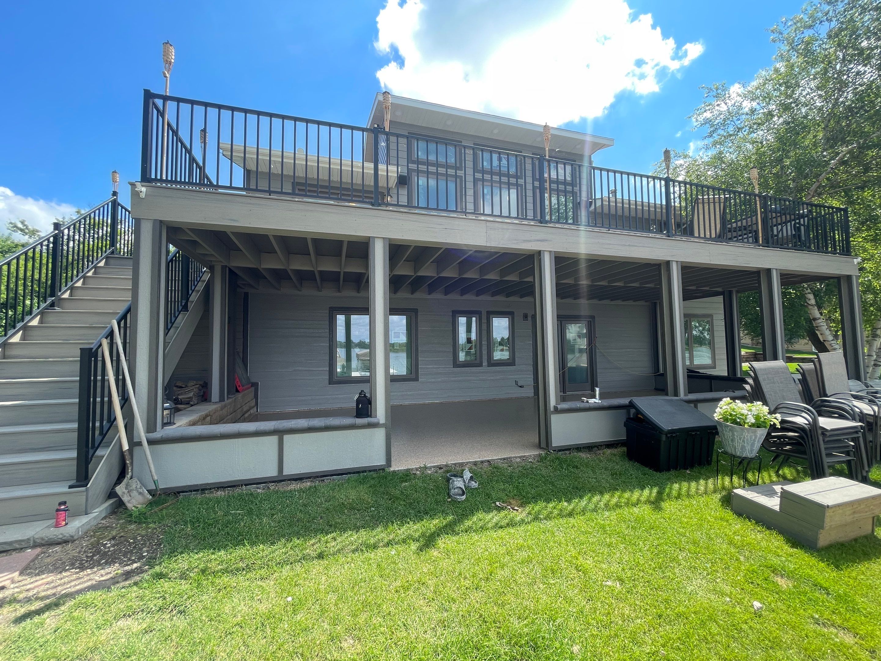 Lakefront Screened Patio Concrete Coating Installation in Wentworth by Select Painting, Coatings & Garage Cabinets
