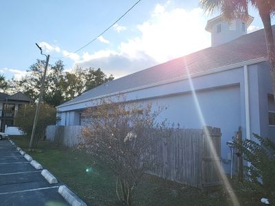 Seamless Gutter Installation Using White K-Style Gutters