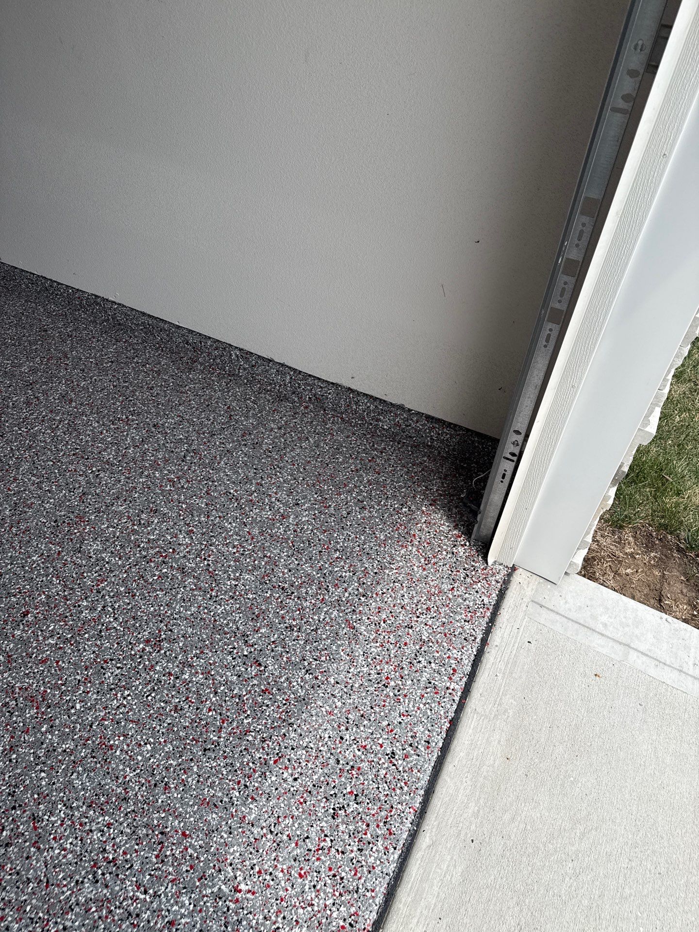 Custom Flake Garage Floor Coating Installation in Altoona by Revival Concrete Coatings
