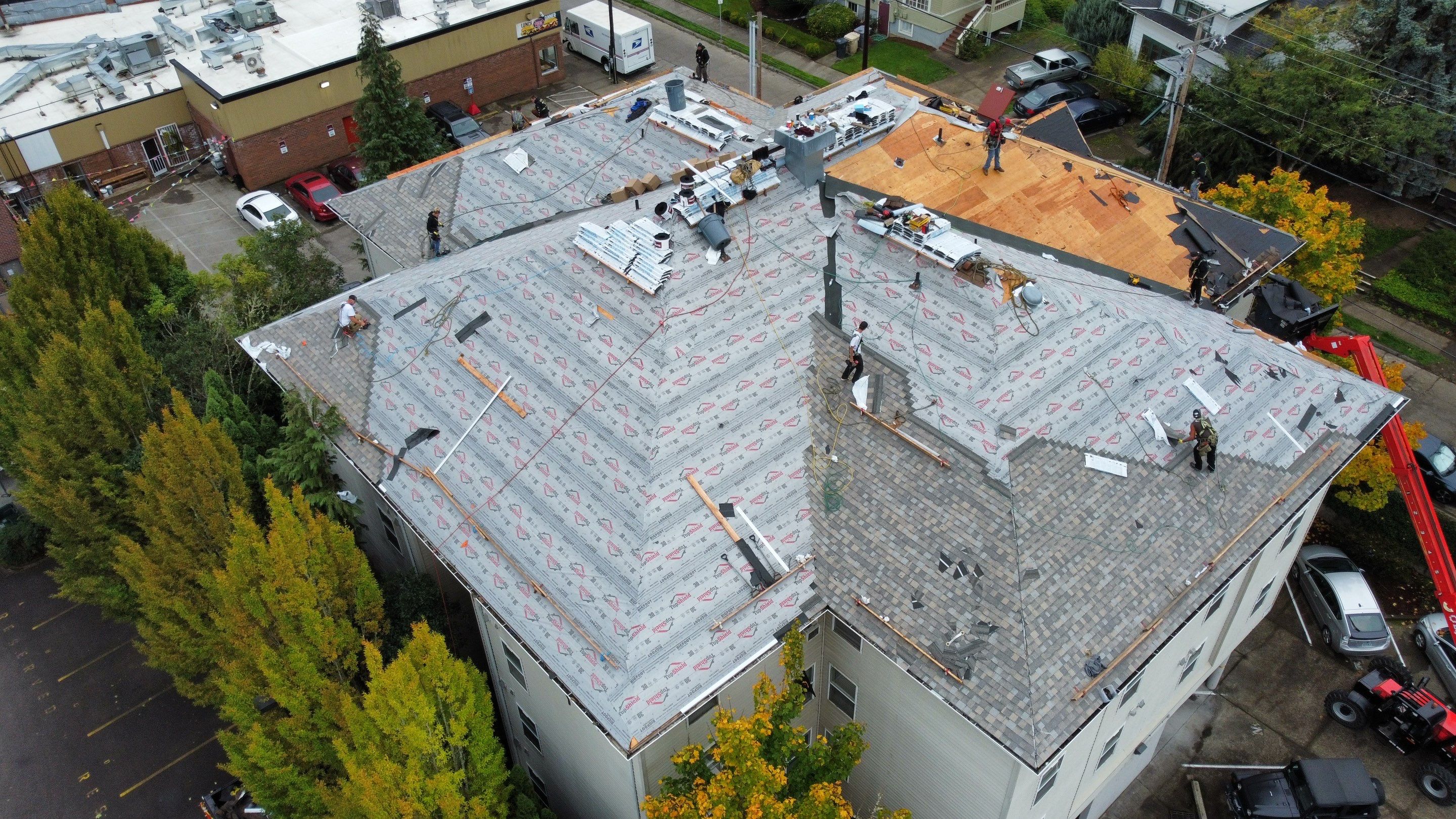 Commercial Roofing Installation using IKO Dynasty (Color: Biscayne) by Orezona Building & Roofing Company, Inc.