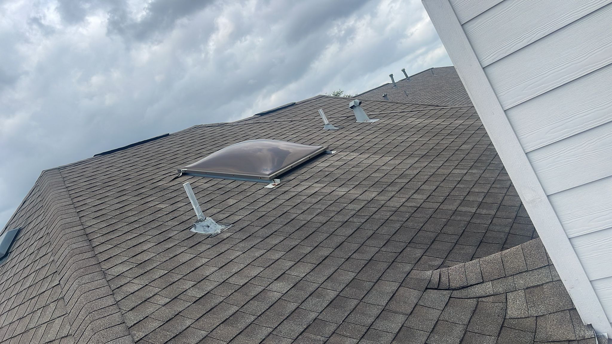 Hail Damage using Owen's Corning Duration (Lifetime) Shingles by Roof Repair Company