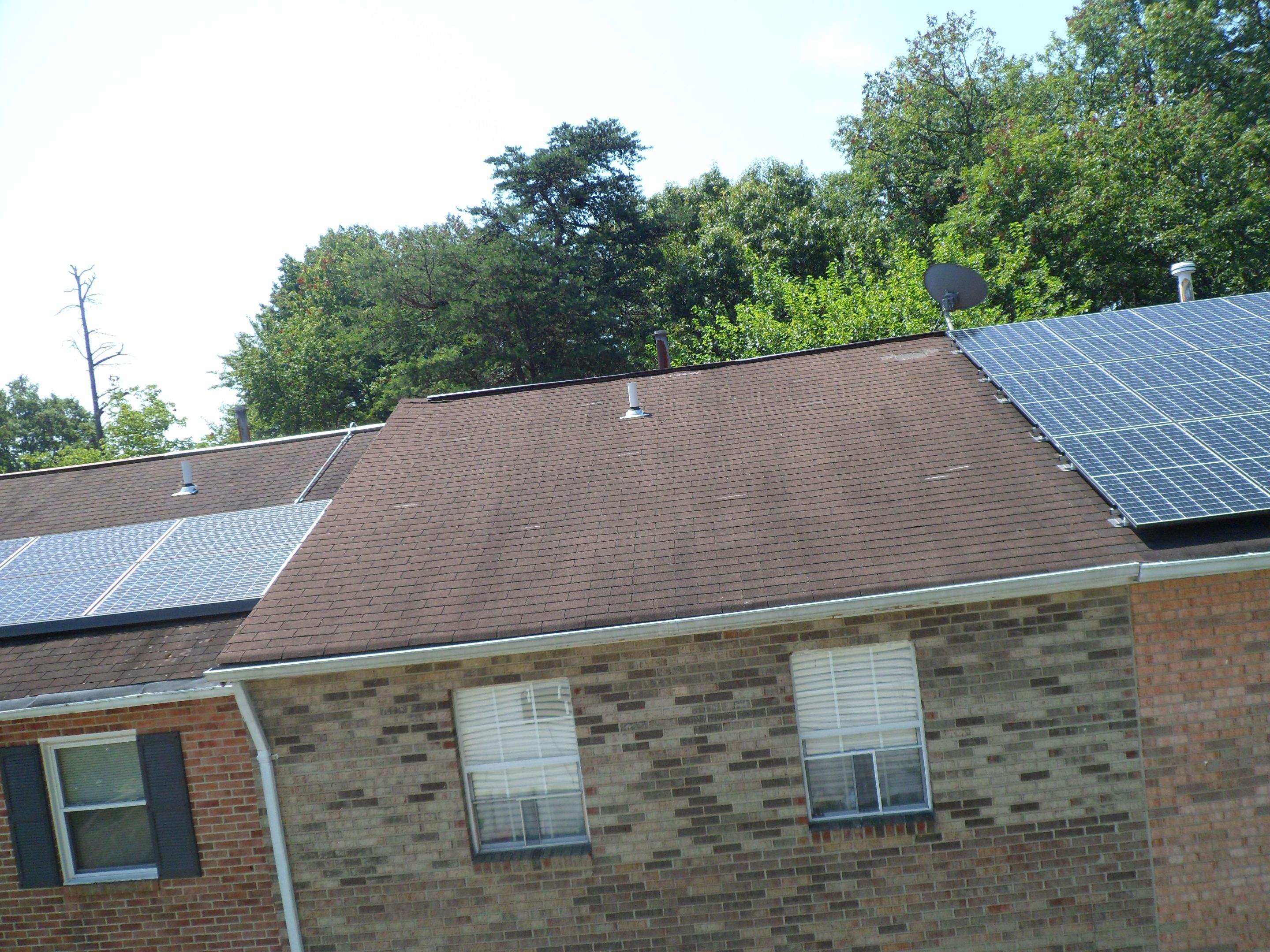 Residential Roofing Installation using Landmark Shingles Color Weatherwood by Alpha Design Services