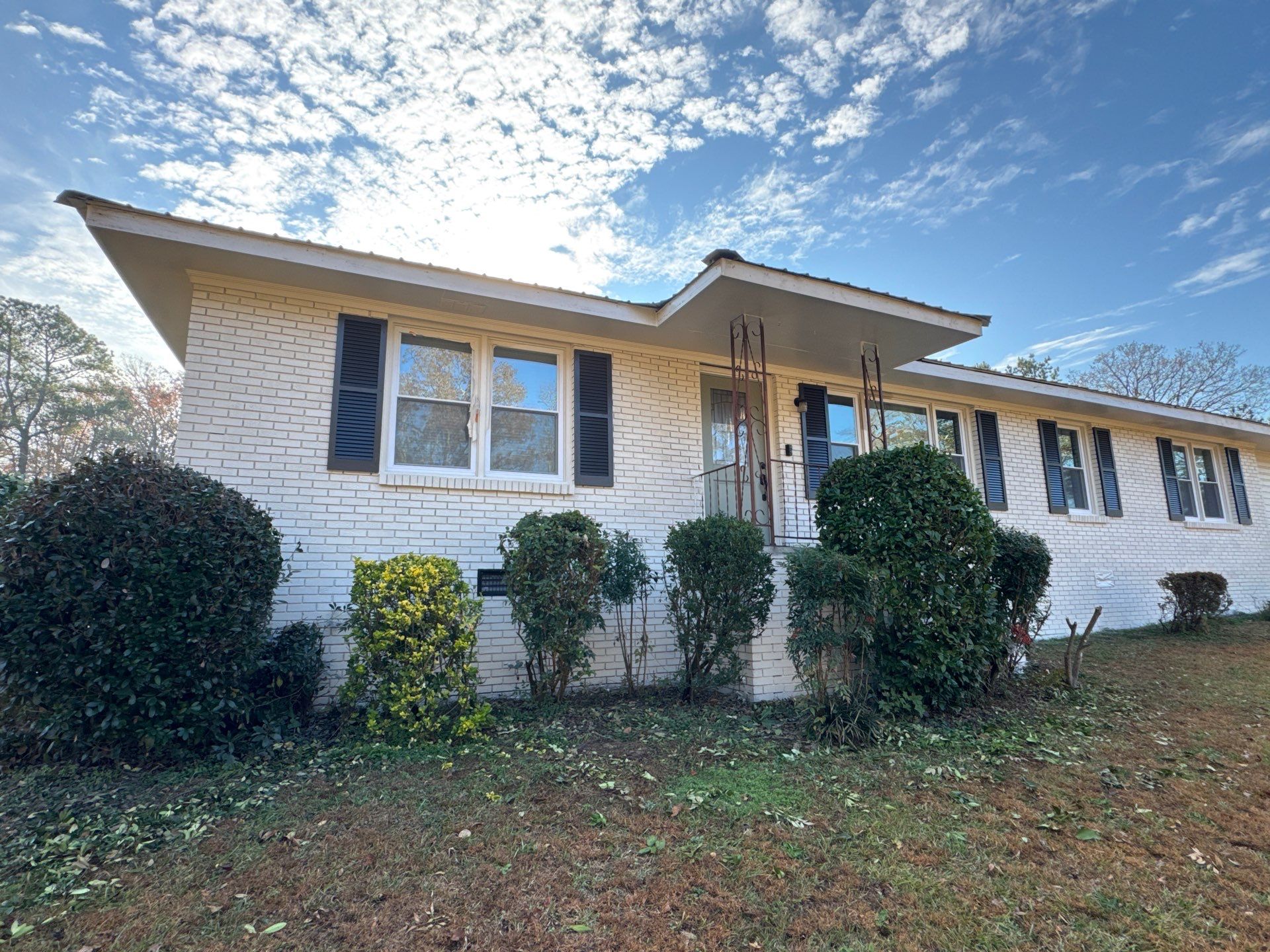 White Masonry Painting and Exterior Home Refresh in Covington by PGP Surface Solutions, LLC