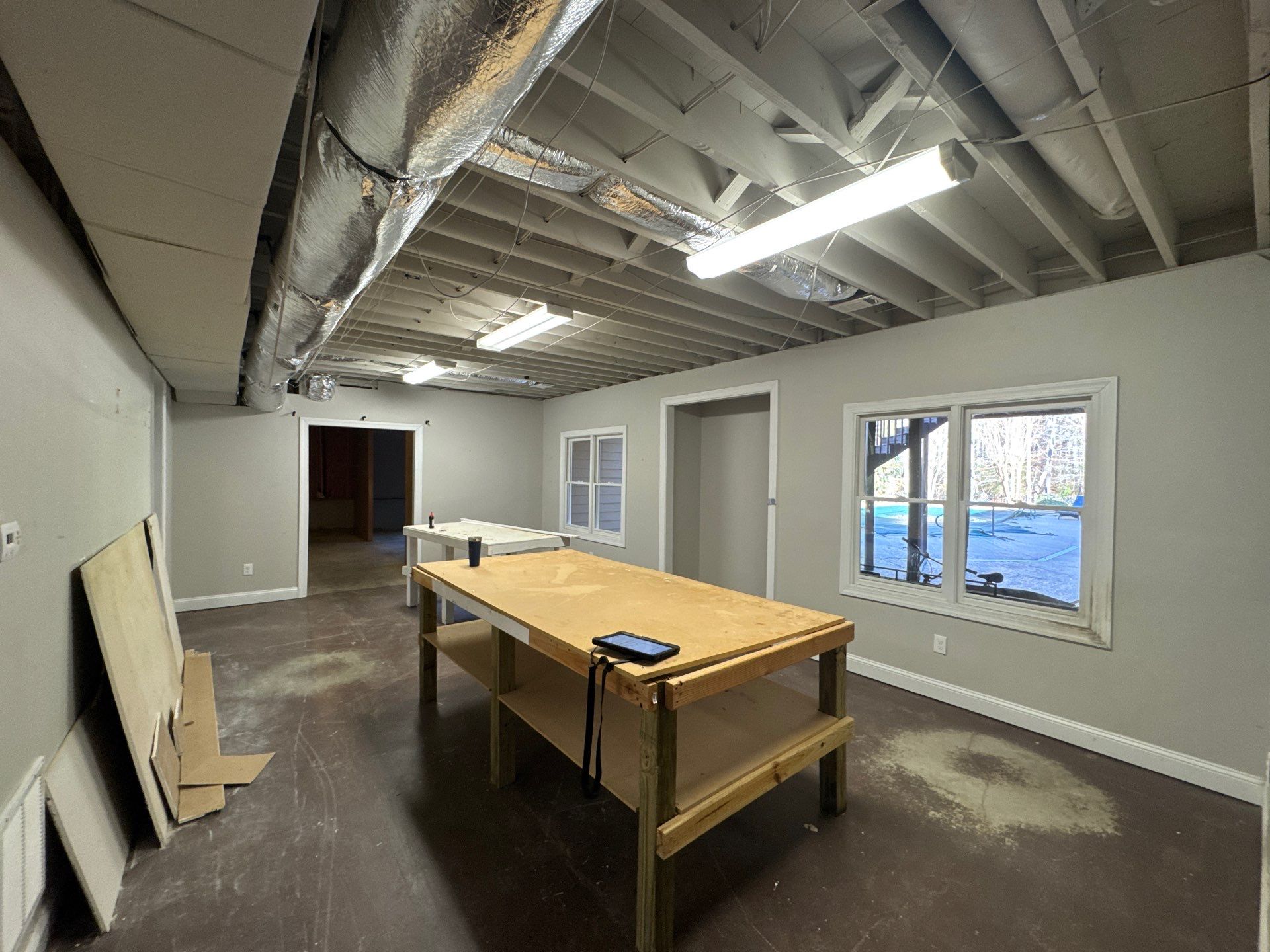 Full Basement Remodel in Powder Springs Featuring Custom Kitchenette by Swift Home Renovations