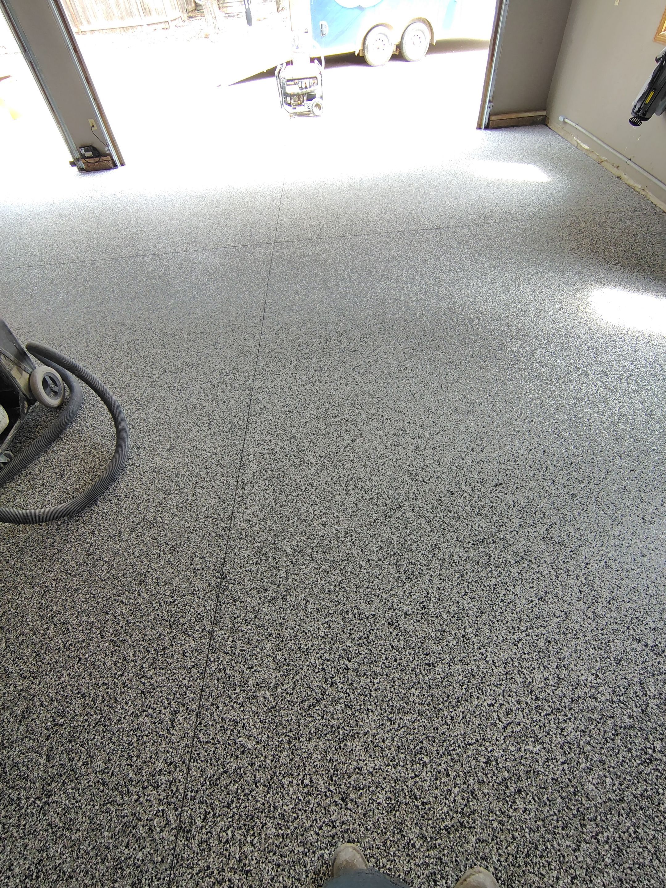 Garage Floor Concrete Coating and Crack Repair in Sioux Falls by Select Painting, Coatings & Garage Cabinets