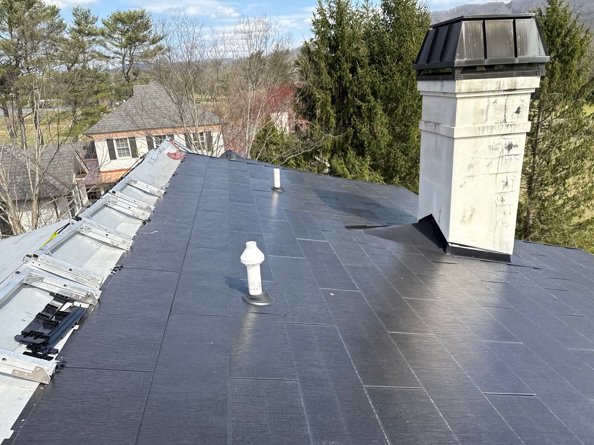 Tesla Solar Roof using Tesla Solar Roof by American Home Contractors