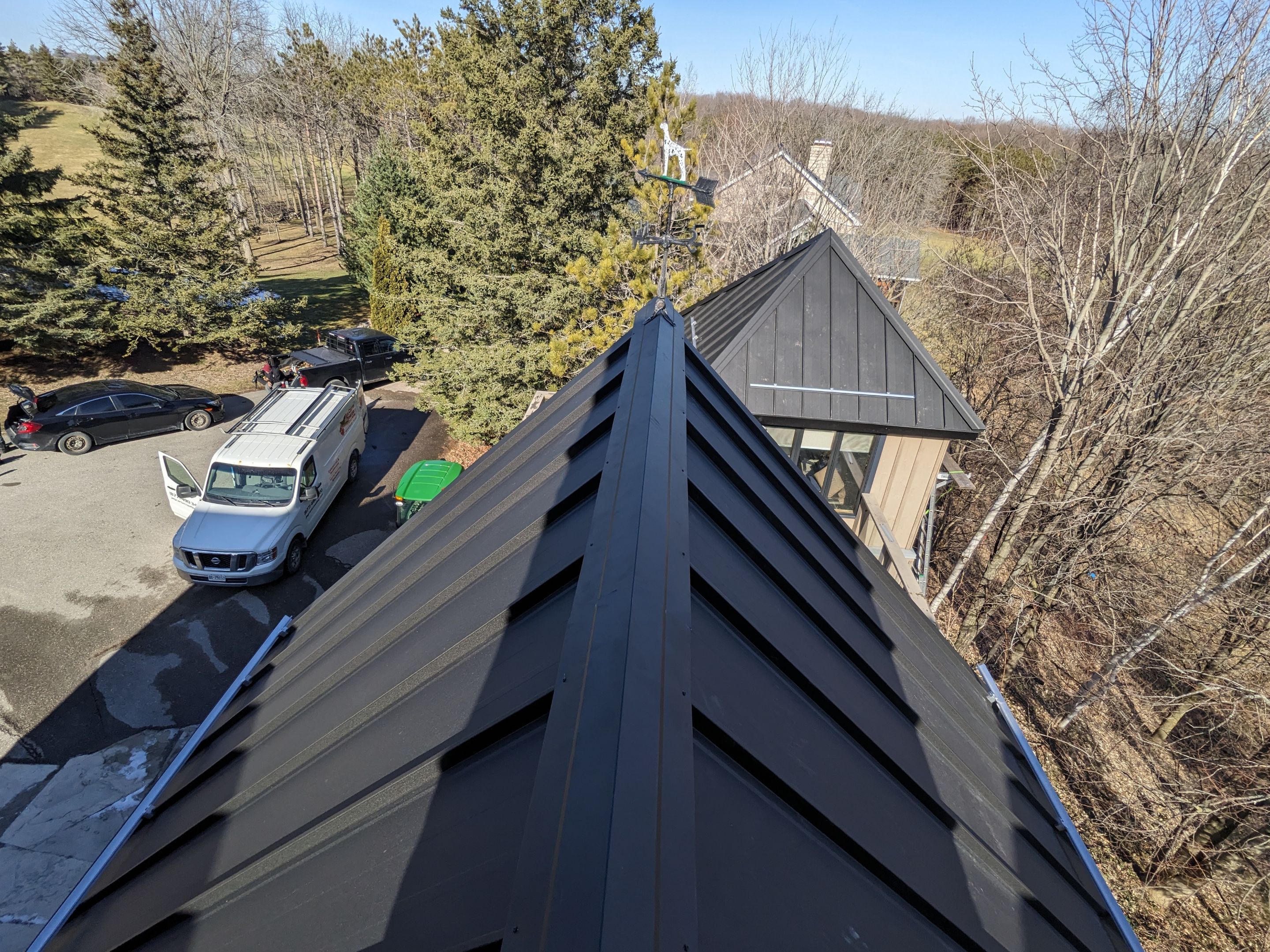 Residential Roofing Installation using 24 Ga Standing Seam Metal by Jay Carter Roofing & Sheet Metal