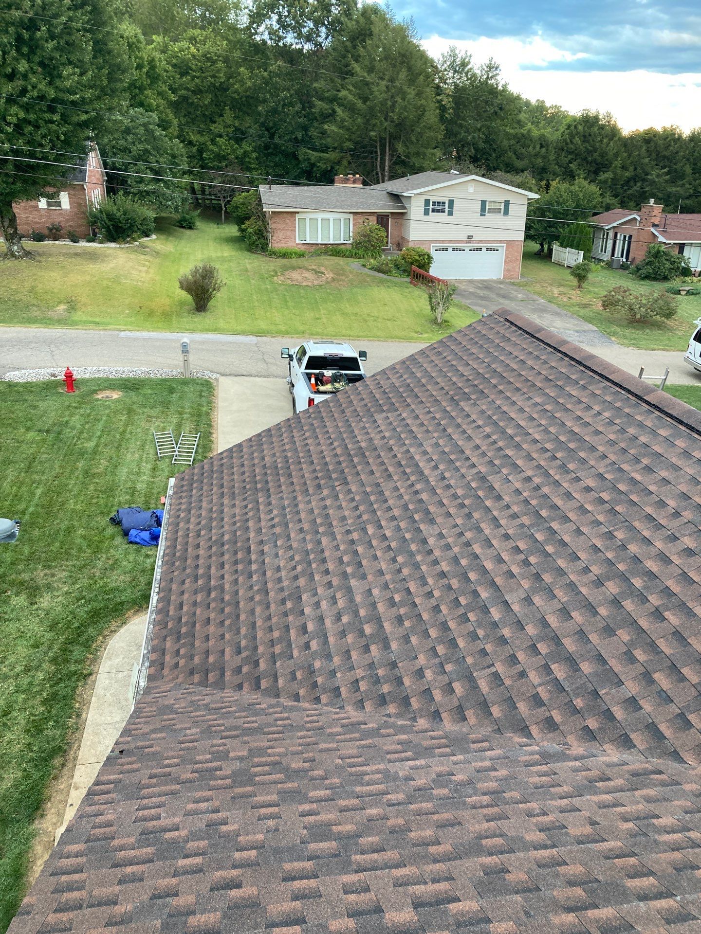 Residential Roofing Installation using GAF TImberline HDZ Hickory by Rainstoppers Roofing