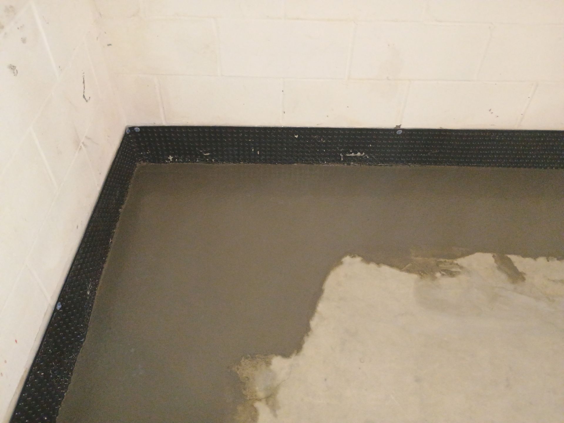 Tying Into an Existing Drain Tile System for Alec by Waterproofing Northeast