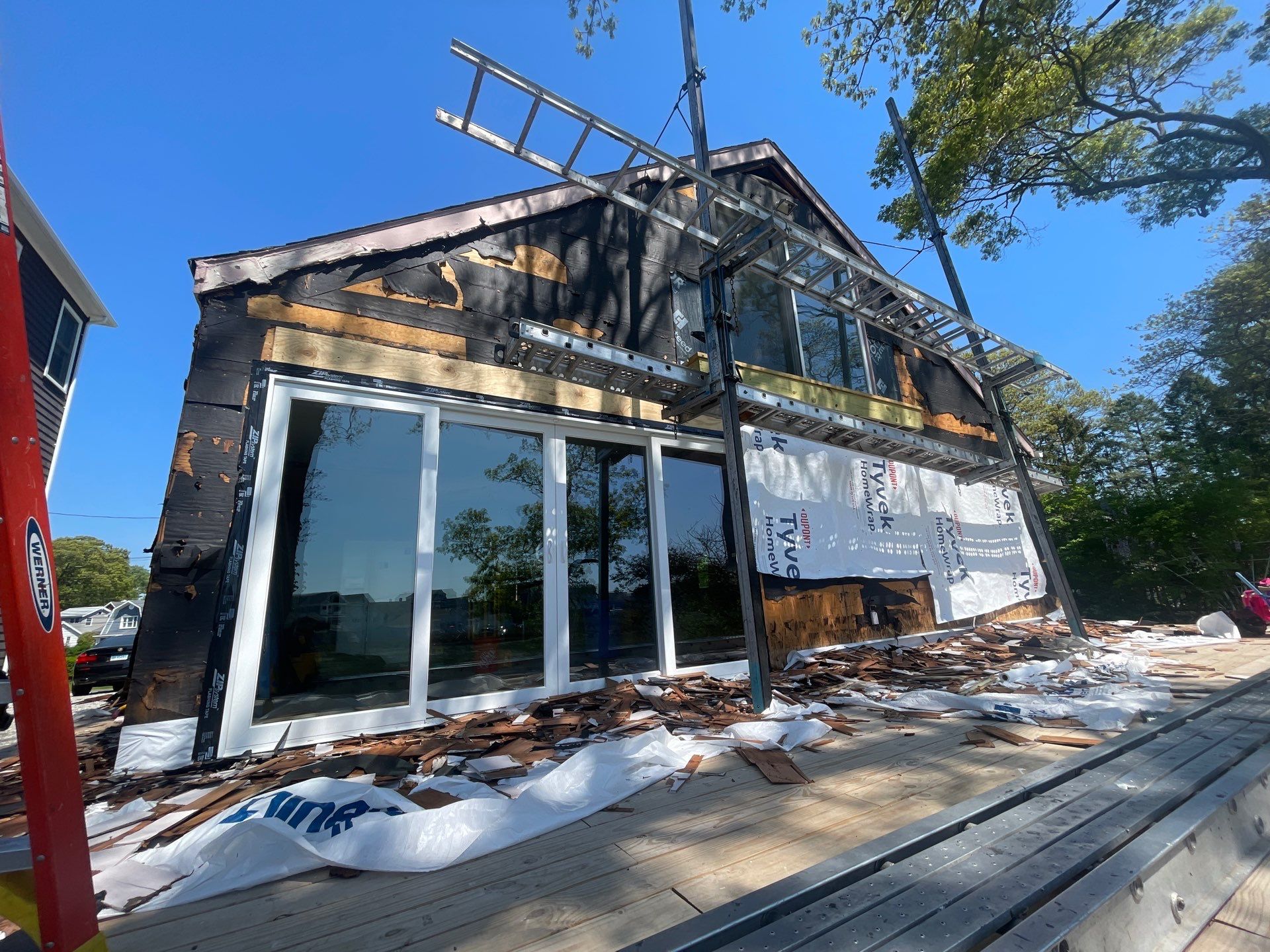 Milford Exterior Renovation Featuring Custom Siding and Wood Deck Installation by A Plus Exterior