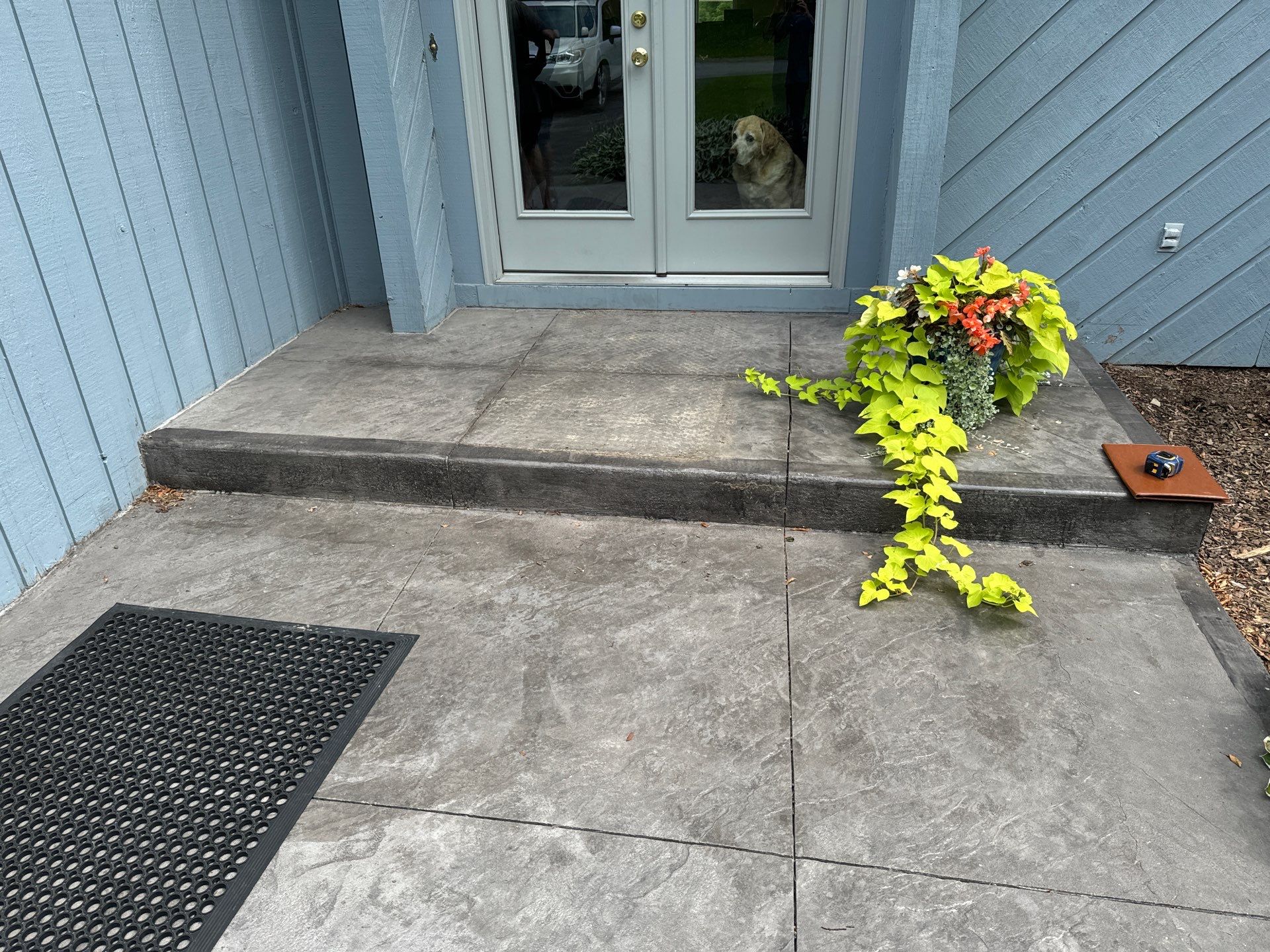 Charcoal Release Border with Broom Finish  by NG Masonry & Construction LLC