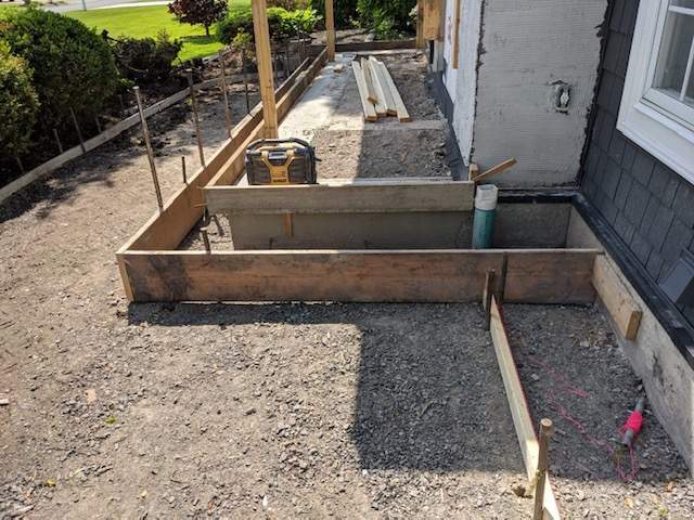 Exterior Renovations- Siding, Concrete, Railings, and Entry Door  by Ivy Lea Construction